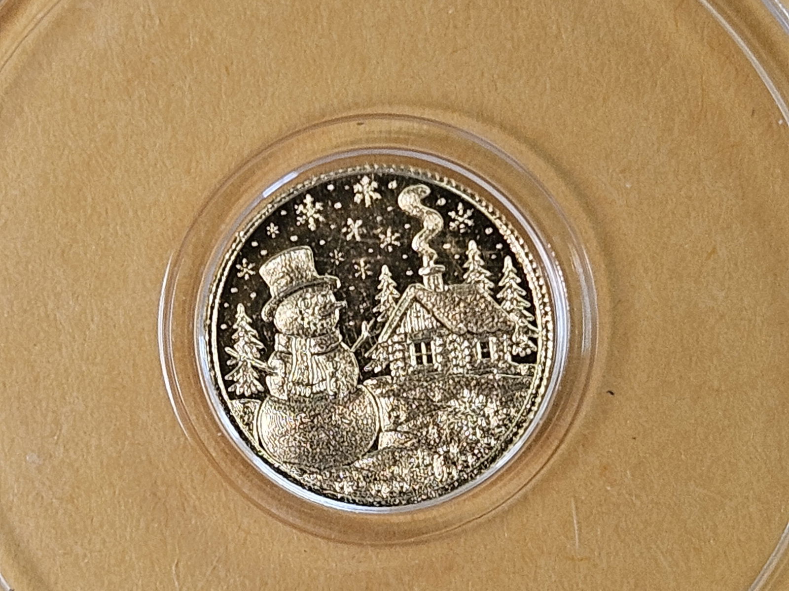 GOLD! 2025 Snowman scene .9999 fine gold round: One-two hundredth troy ounce .9999 fine gold 