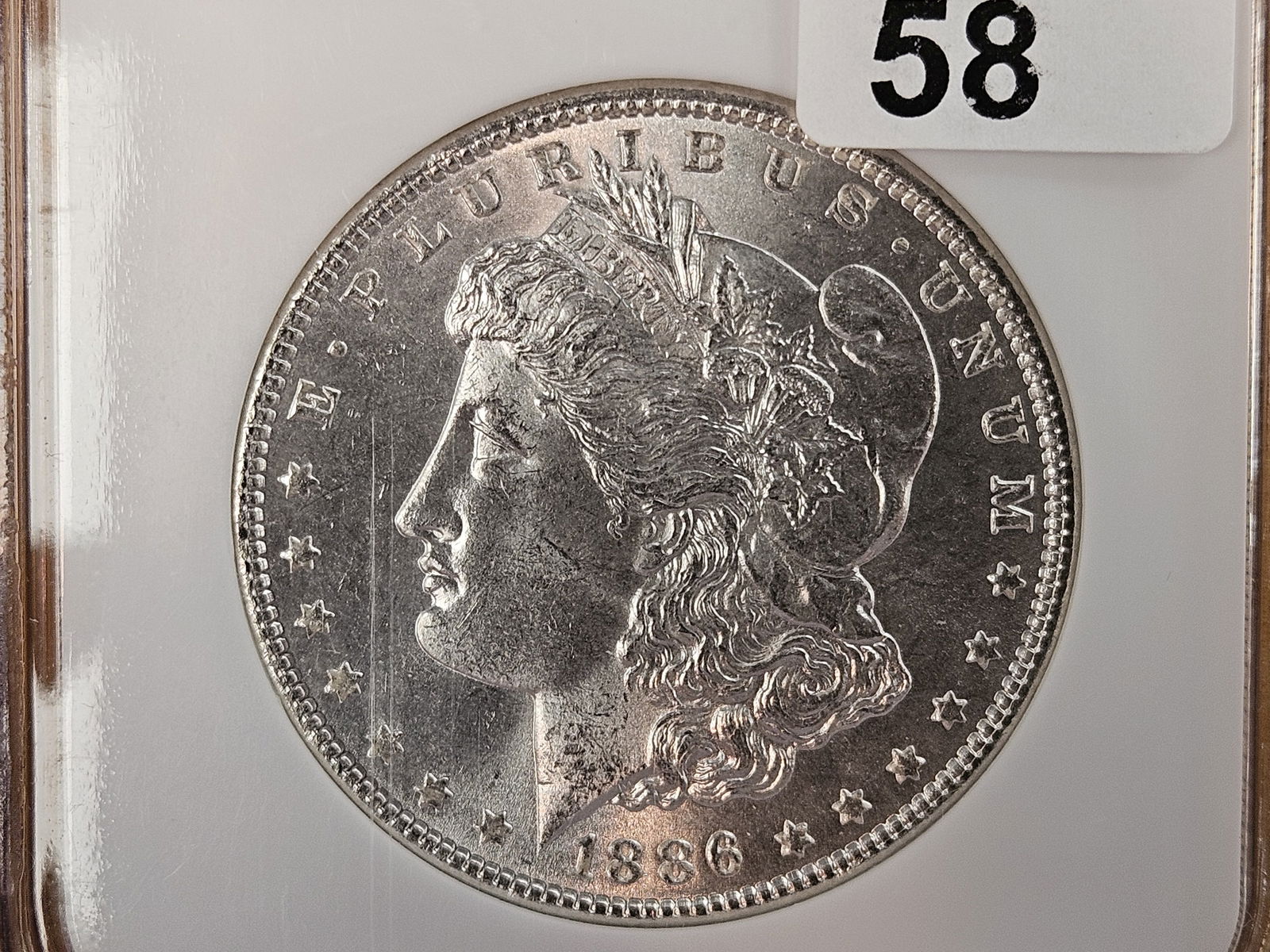 GEM! NGC 1886 Morgan Dollar in Mint State 65: Great contrast 