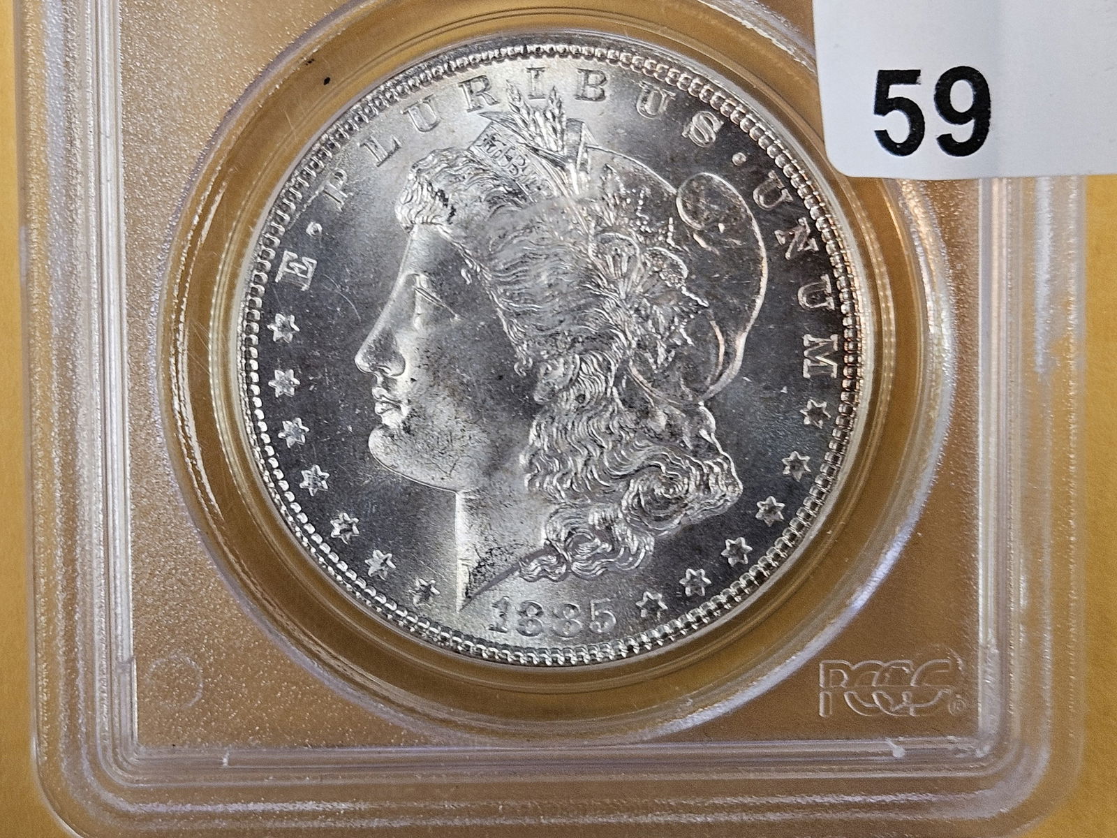 GEM! Old Holder! PCGS 1885 Morgan Dollar in Mint State 66: Gorgeous coin. Possibly upgrade 