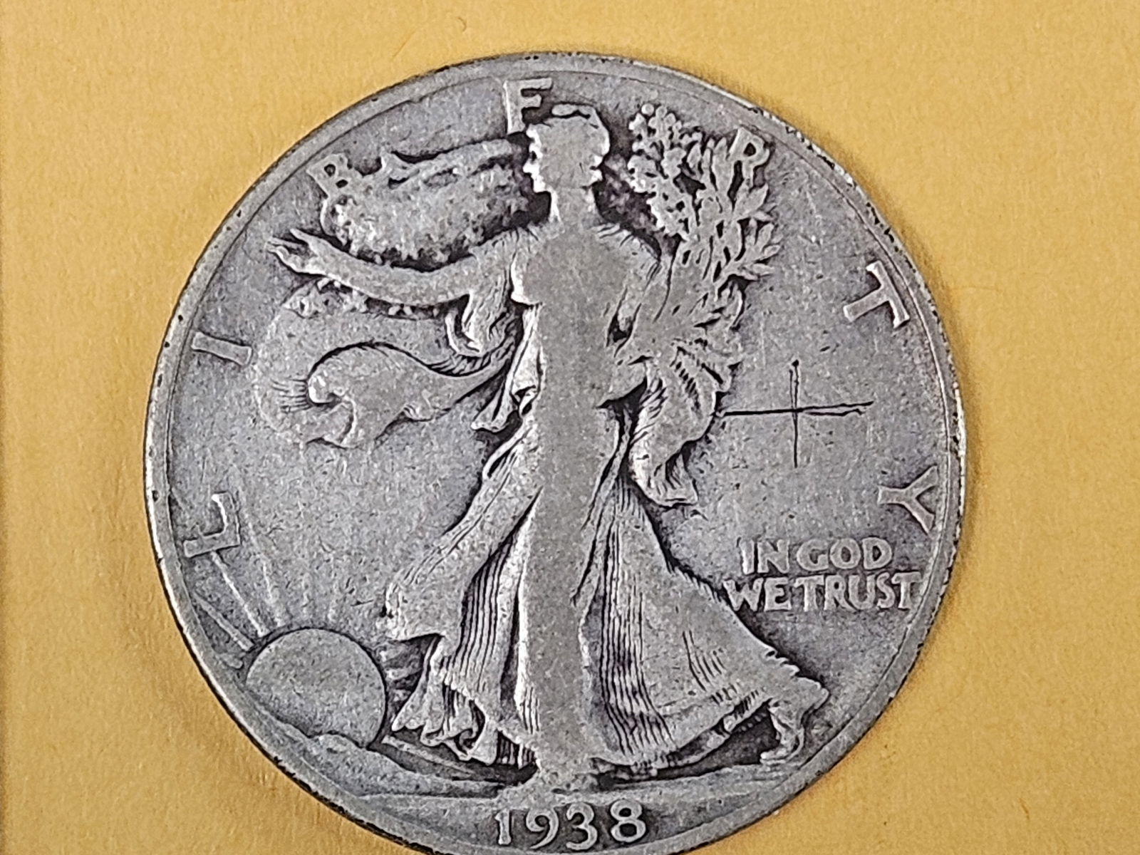 Key Date 1938-D Walking Liberty Half Dollar: Scratched 
