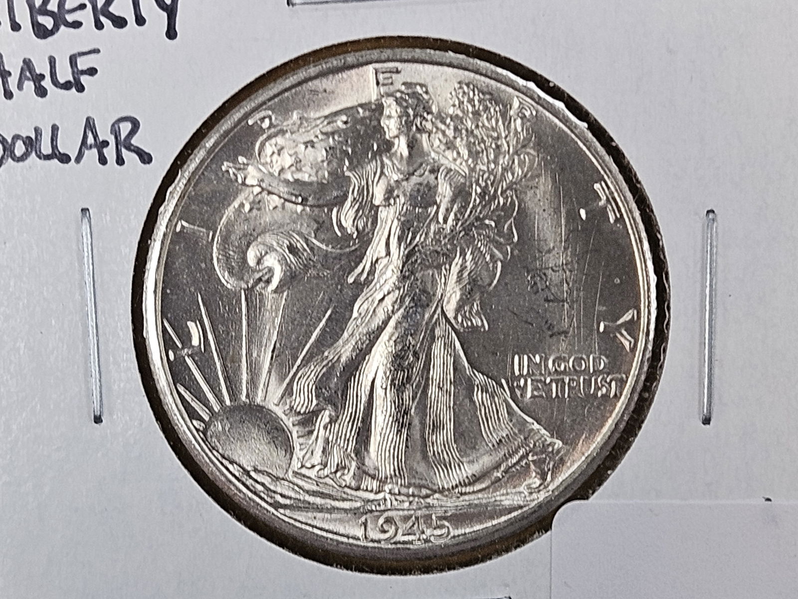 Very Choice Brilliant Uncirculated 1945-S Walking Liberty Half Dollar: Good contrast 