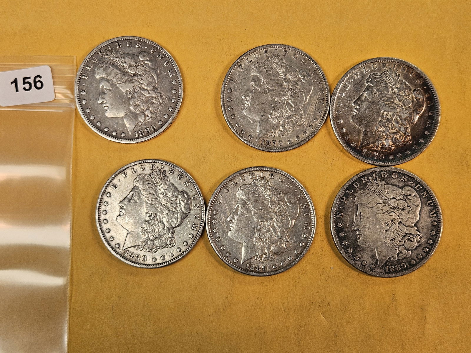 Six Mixed silver Morgan Dollars: Circulated 