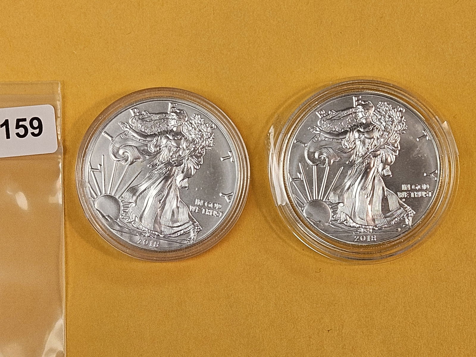 Two GEM Brilliant Uncirculated 2018 American Silver Eagles: In capsules