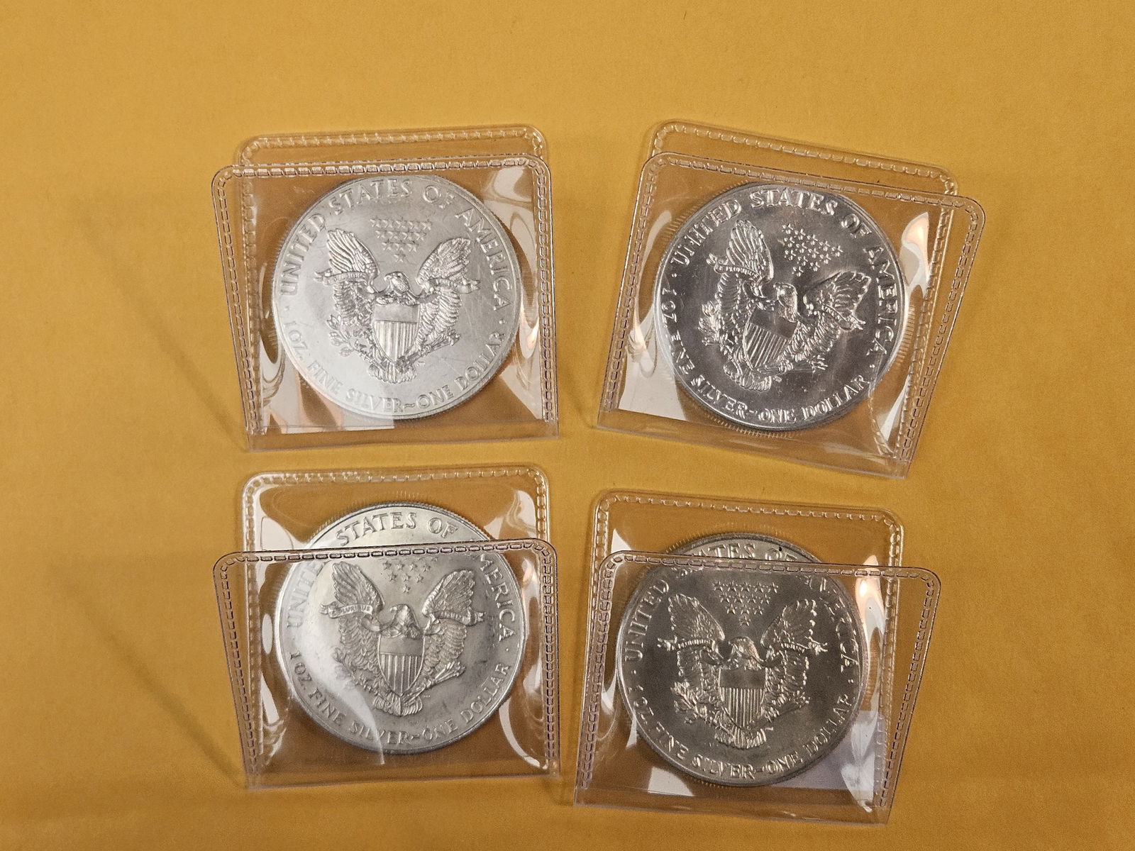 Four mixed American Silver Eagles - 2