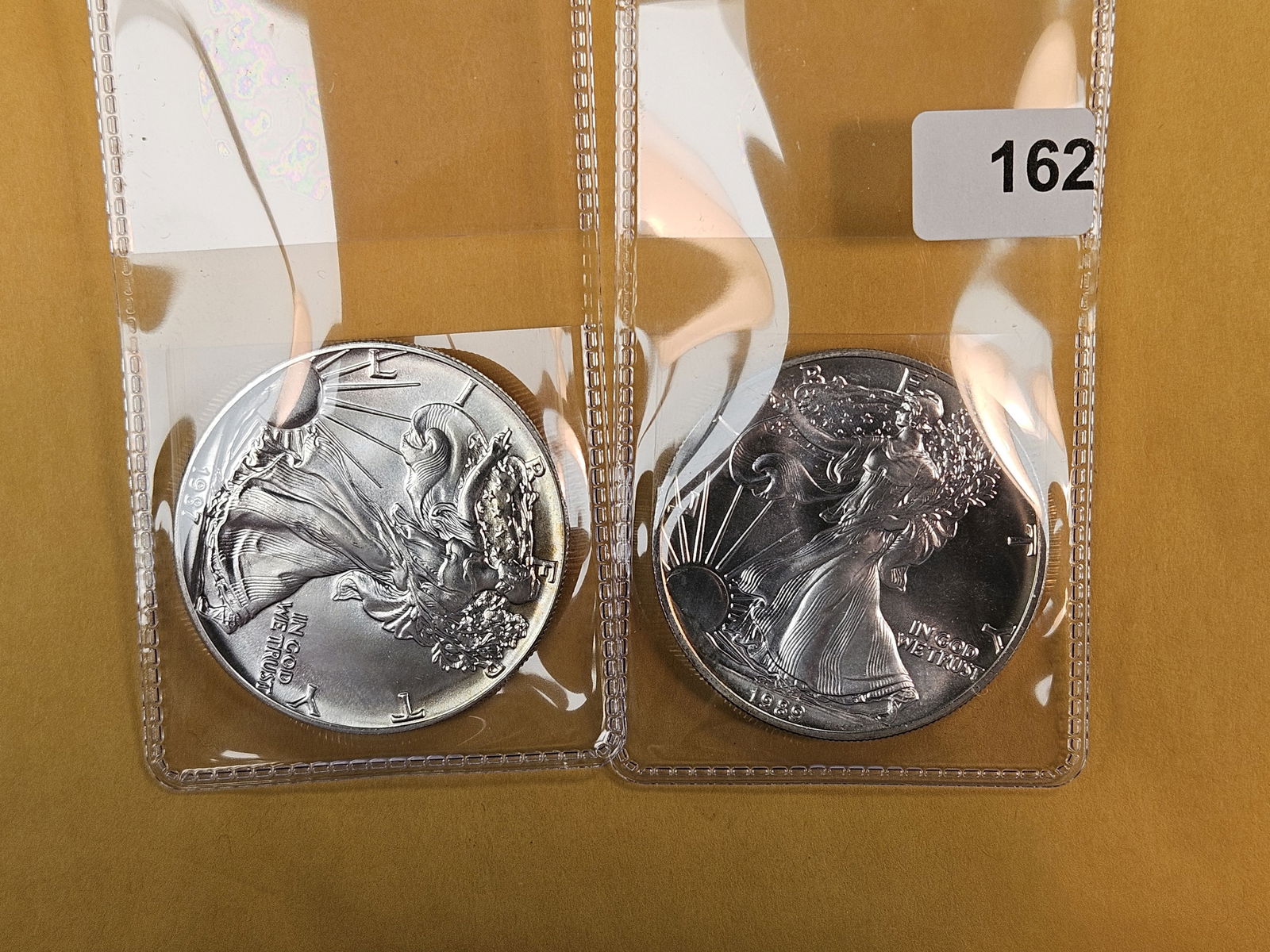 Two GEM Brilliant Uncirculated American Silver Eagles (1 of 2)