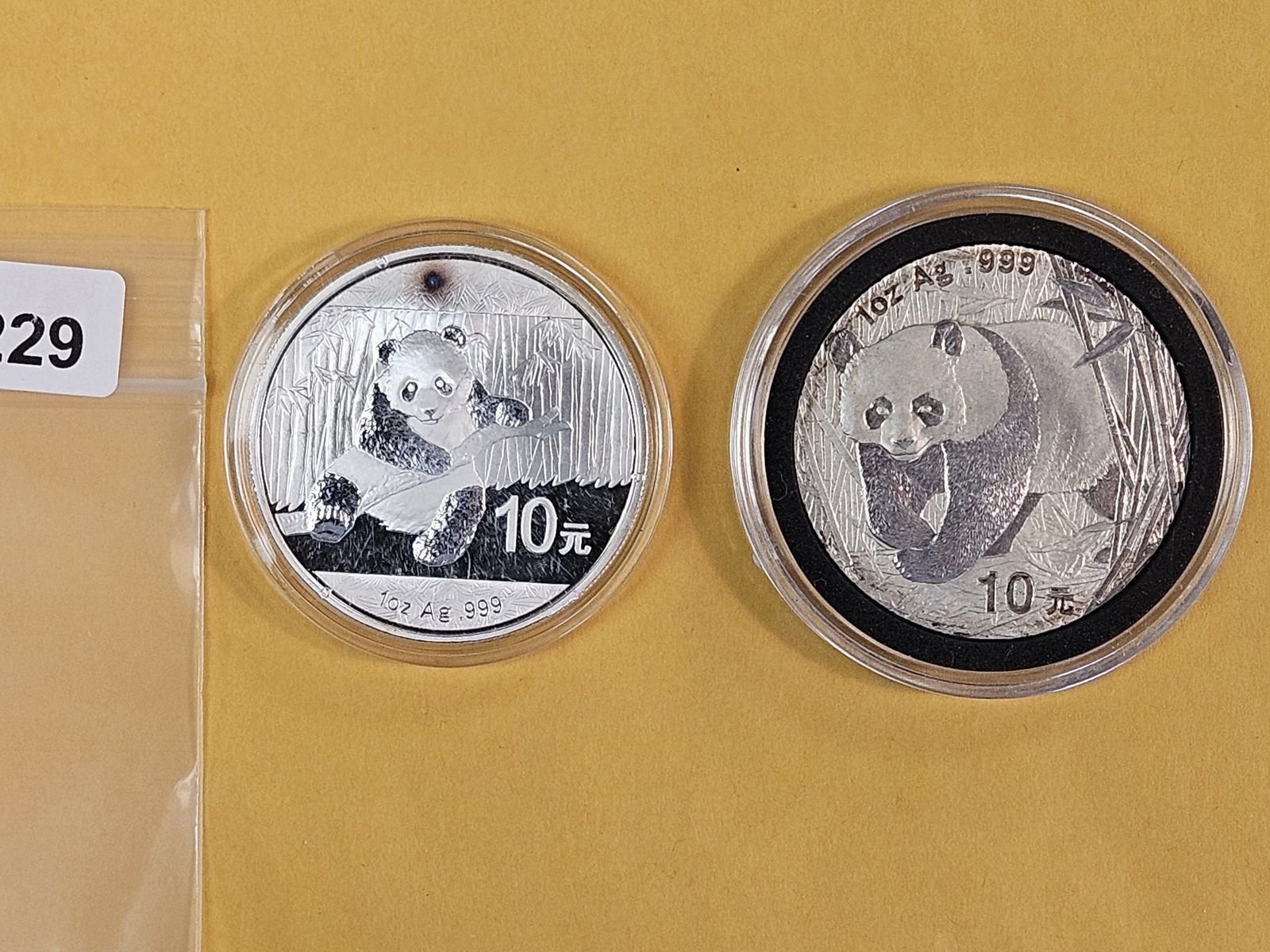 2001 and 2014 China Silver 10 Yuan: Pandas 
