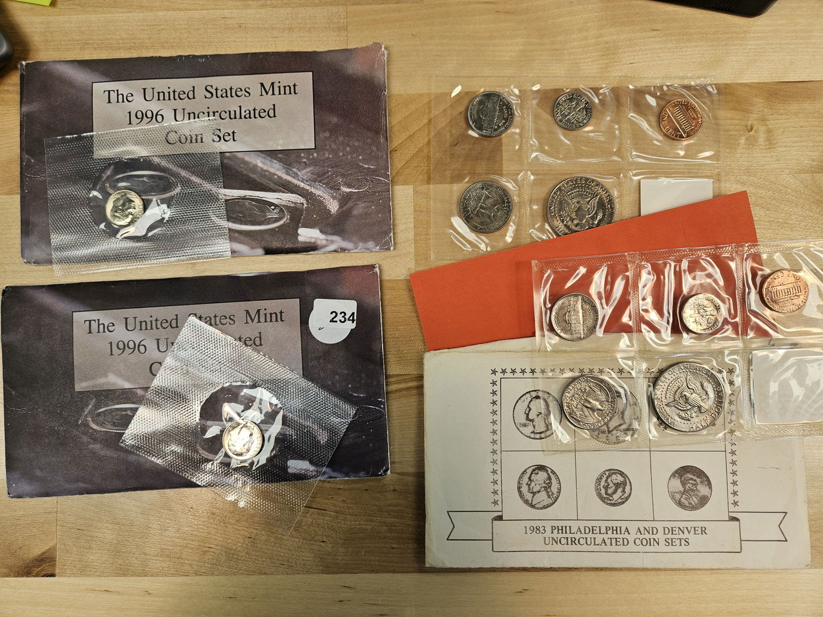 Three US coin Sets: Two 1996 with KEY West Point dime. One of the 1996 does not have the COA and 1983 Philly & Denver coin set 