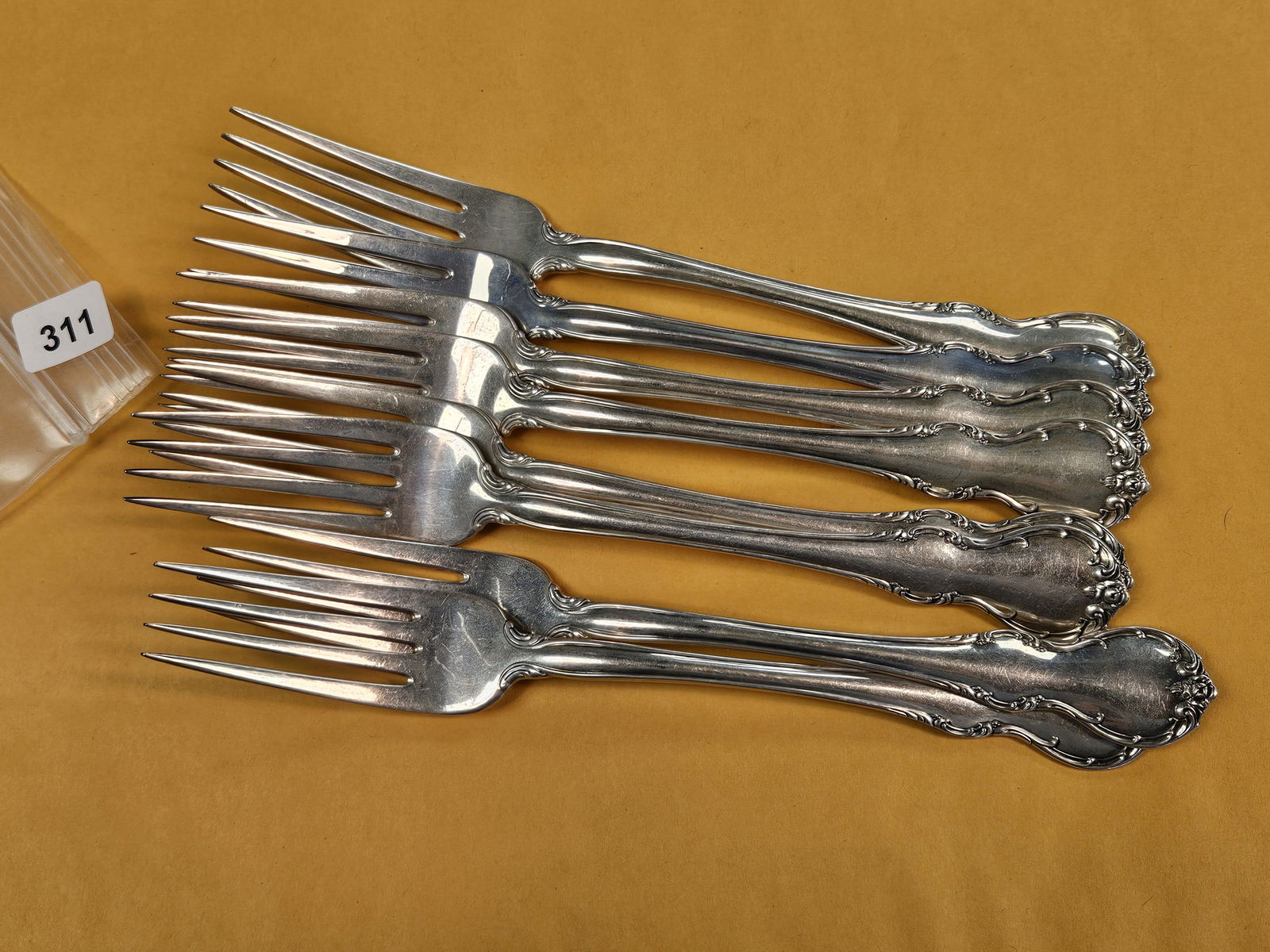 Eight Sterling Silver Forks: From a different group. These weigh a total of 389.6 Grams or 12.525 Troy ounces. As of today that's over $1,000 in silver! 