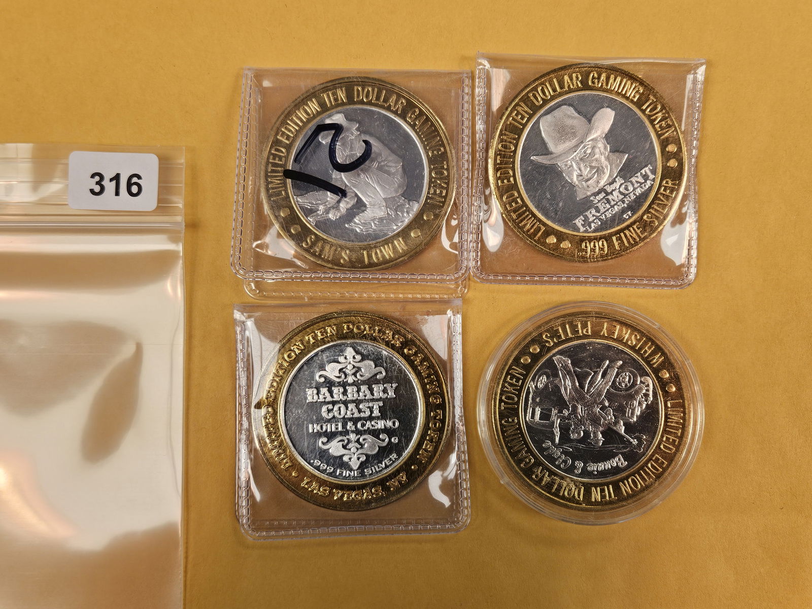 Four Ten Dollar .999 fine Silver Center Casino Gaming Tokens: Mixed 