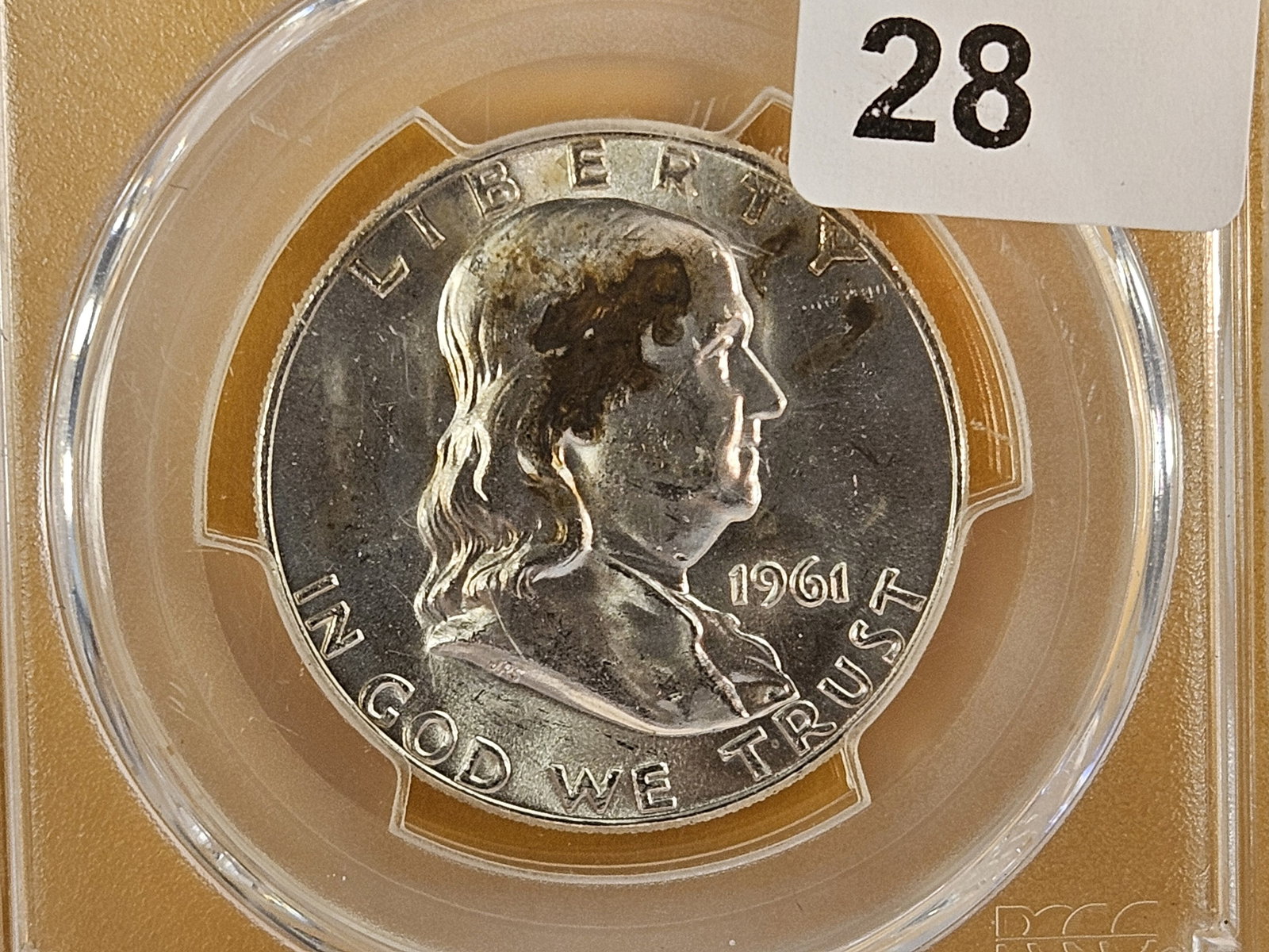 PCGS 1961-D Franklin Silver Half Dollar in Mint State 63: Lightly toned