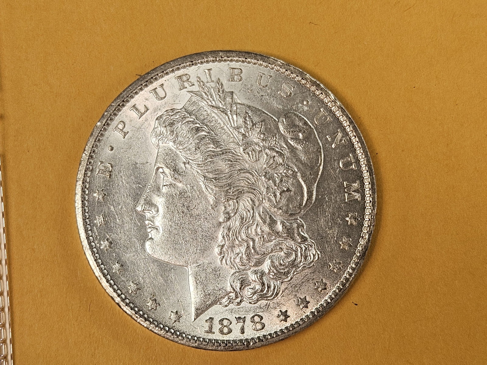 ** KEY DATE ** 1878-CC Morgan Dollar in Brilliant About Uncirculated - 58 - 4