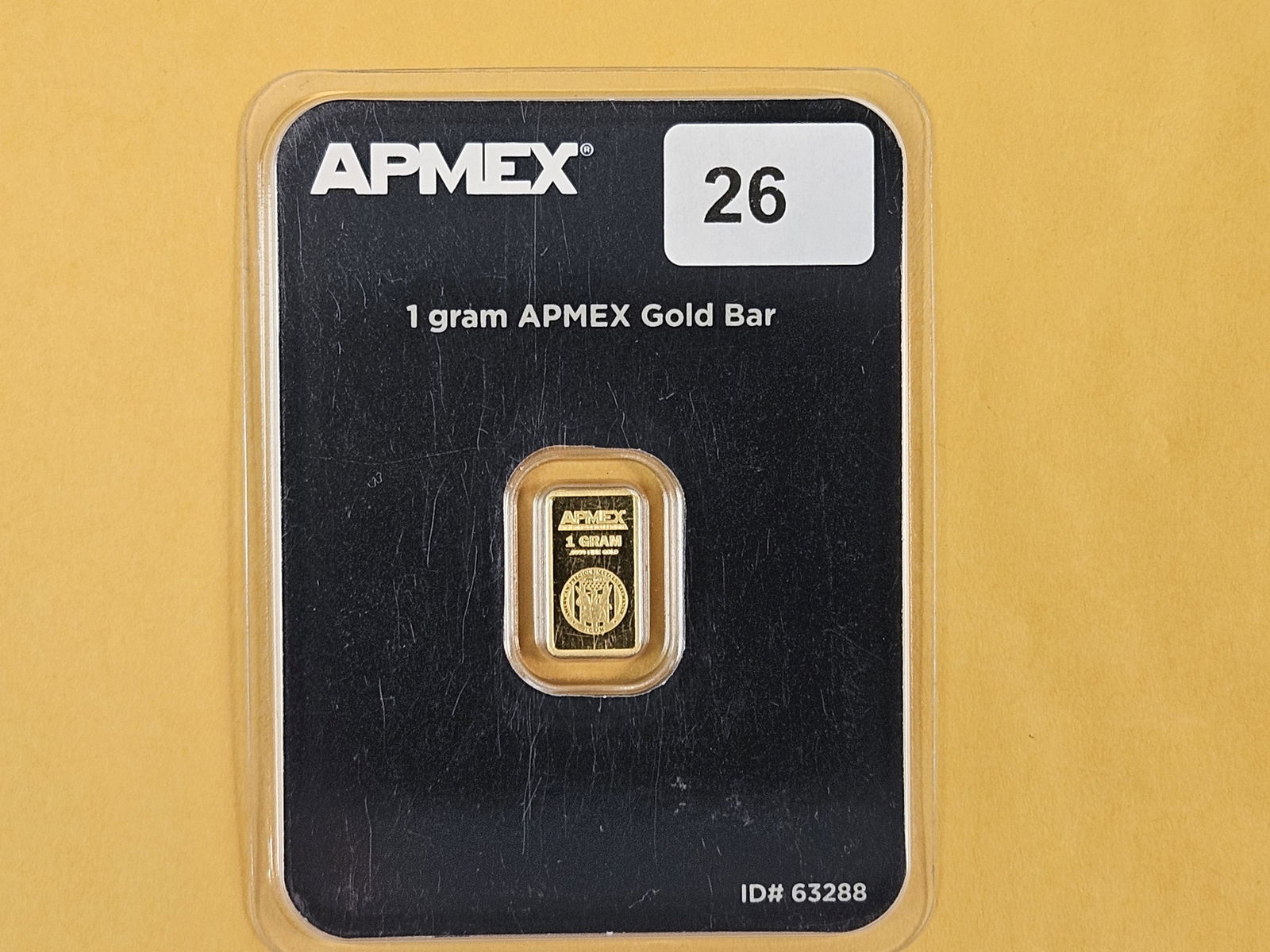 GOLD! APMEX One Gram .9999 fine gold bar: In assay holder
