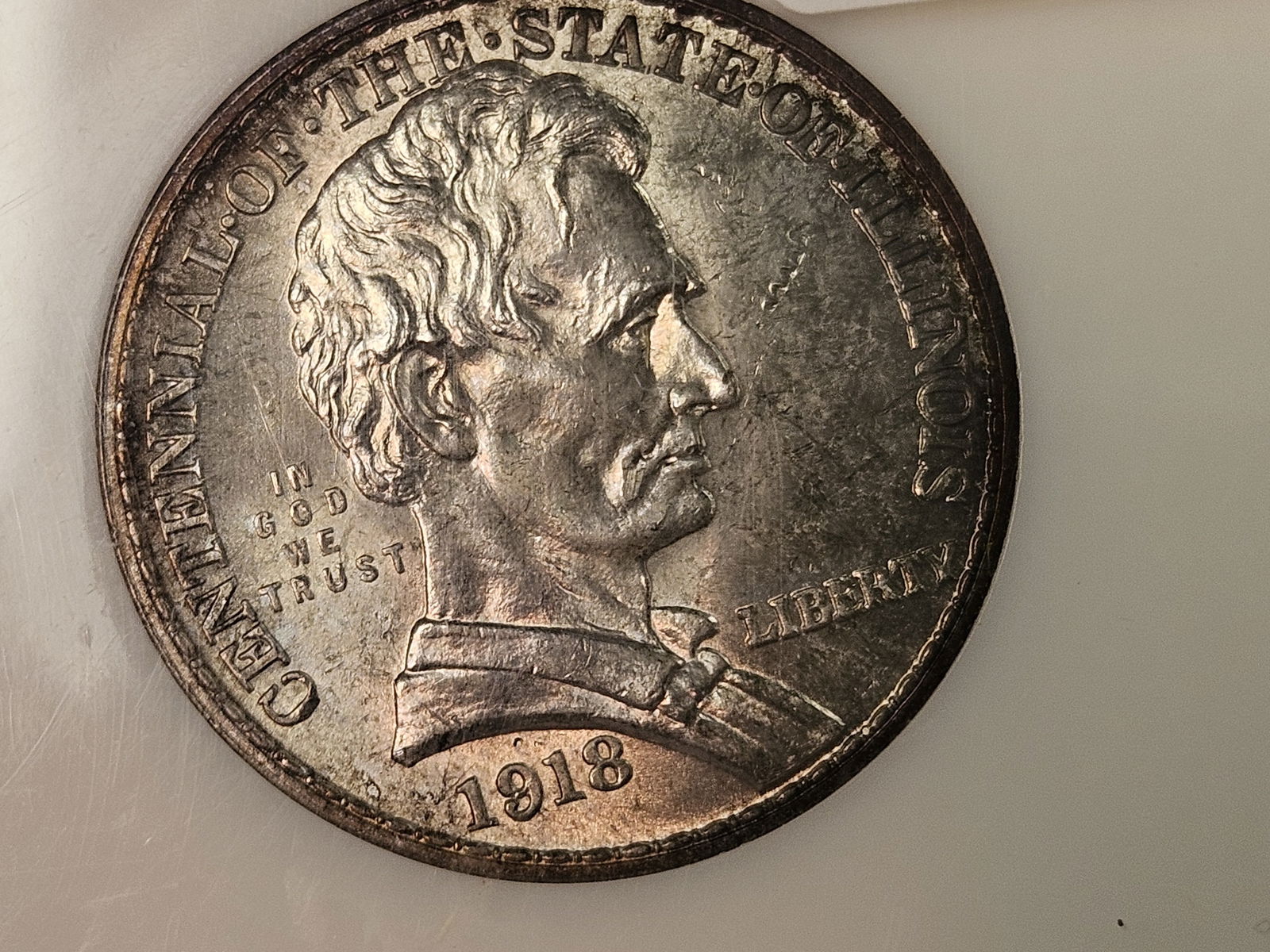 PCI 1918 Commemorative Silver Half Dollar in Mint State 60: Lincoln. Great patina! 