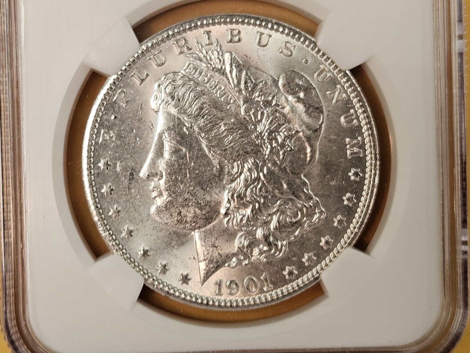 NGC 1901-O Morgan Dollar in Mint State 63: Satiny Luster 
