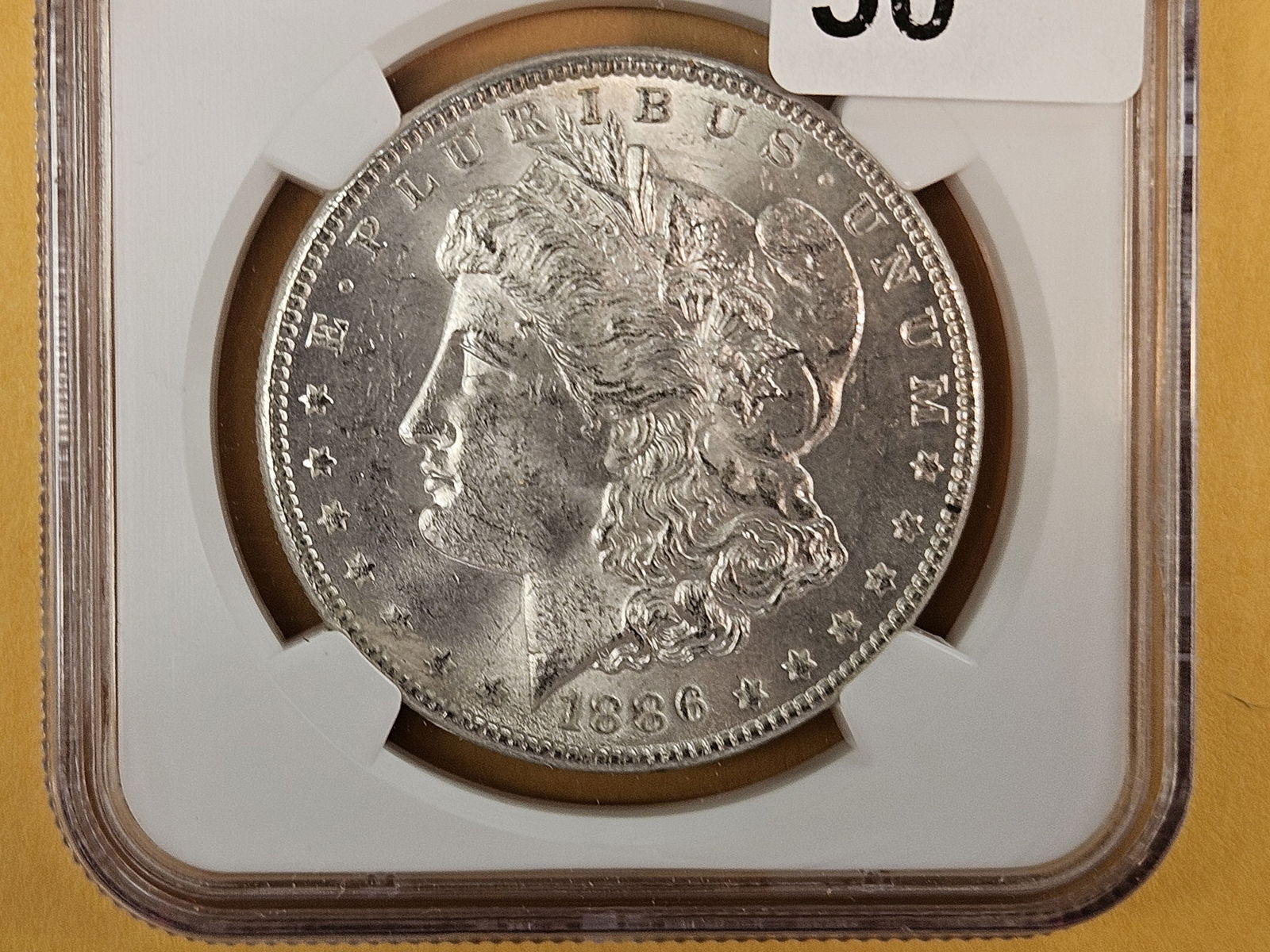 NGC 1886 Morgan Dollar in Mint State 63: Satiny cartwheel 