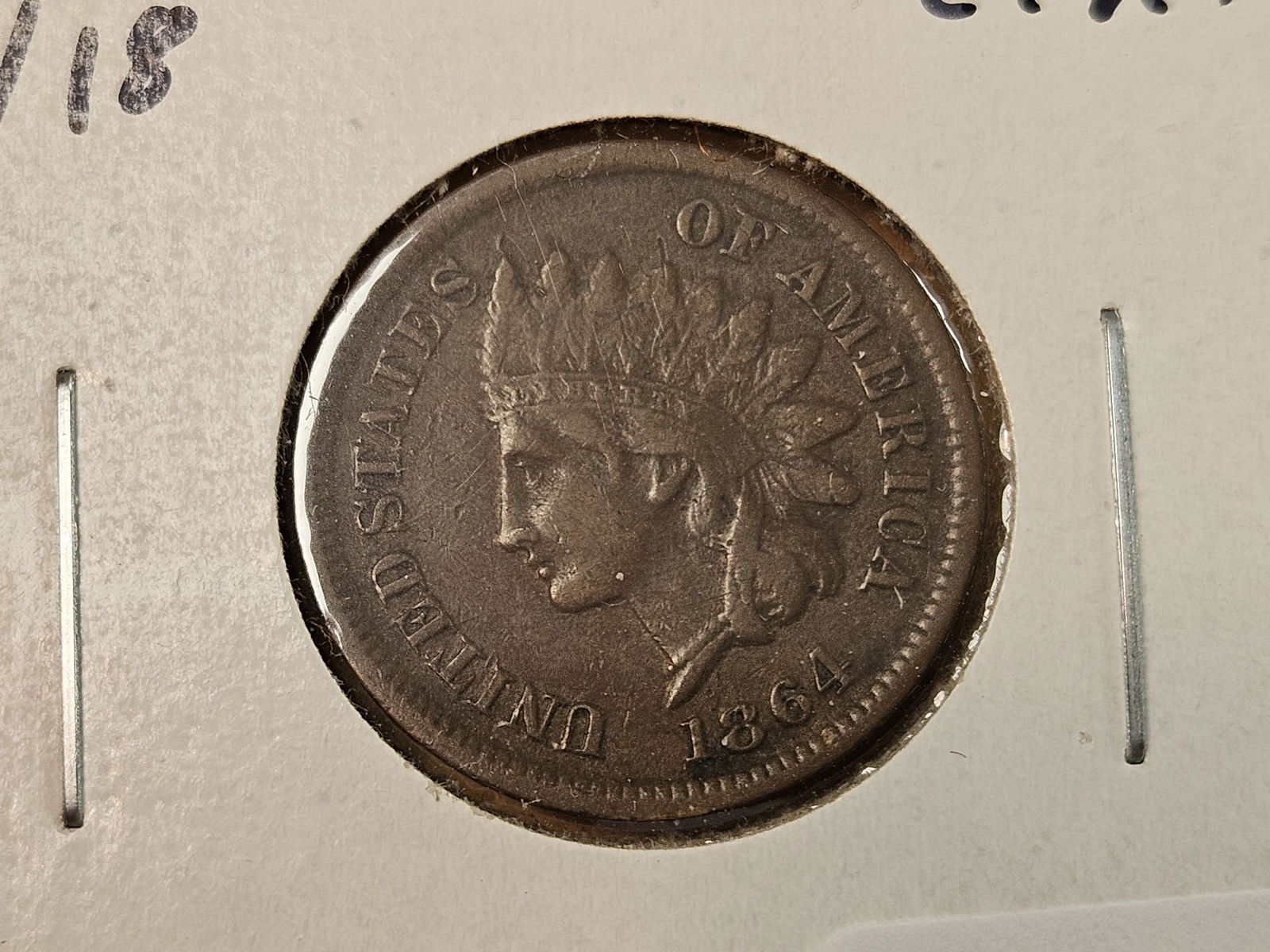 * Key Variety on a Key Variety! 18/1864-L Indian Cent: Graded in Very Fine plus. This is the L on ribbon variety. Nice grade. Fivas-Stanton FS-2304. Snow S-5. 18 over 18 