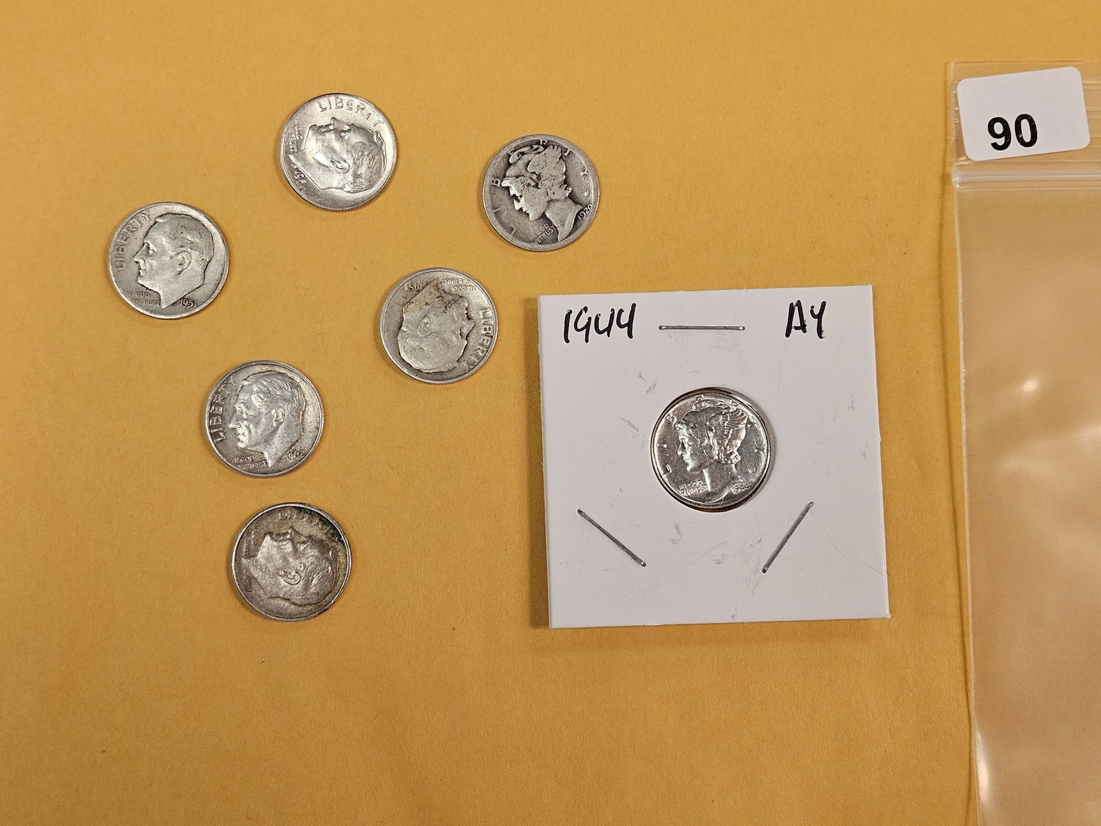 Seven mixed silver Dimes (1 of 2)