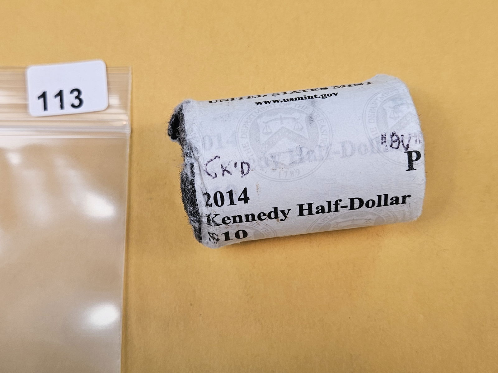Original US MINT-wrapped roll of 2014 Kennedy half Dollars: Ends are gem. From consignor. Unopened 
