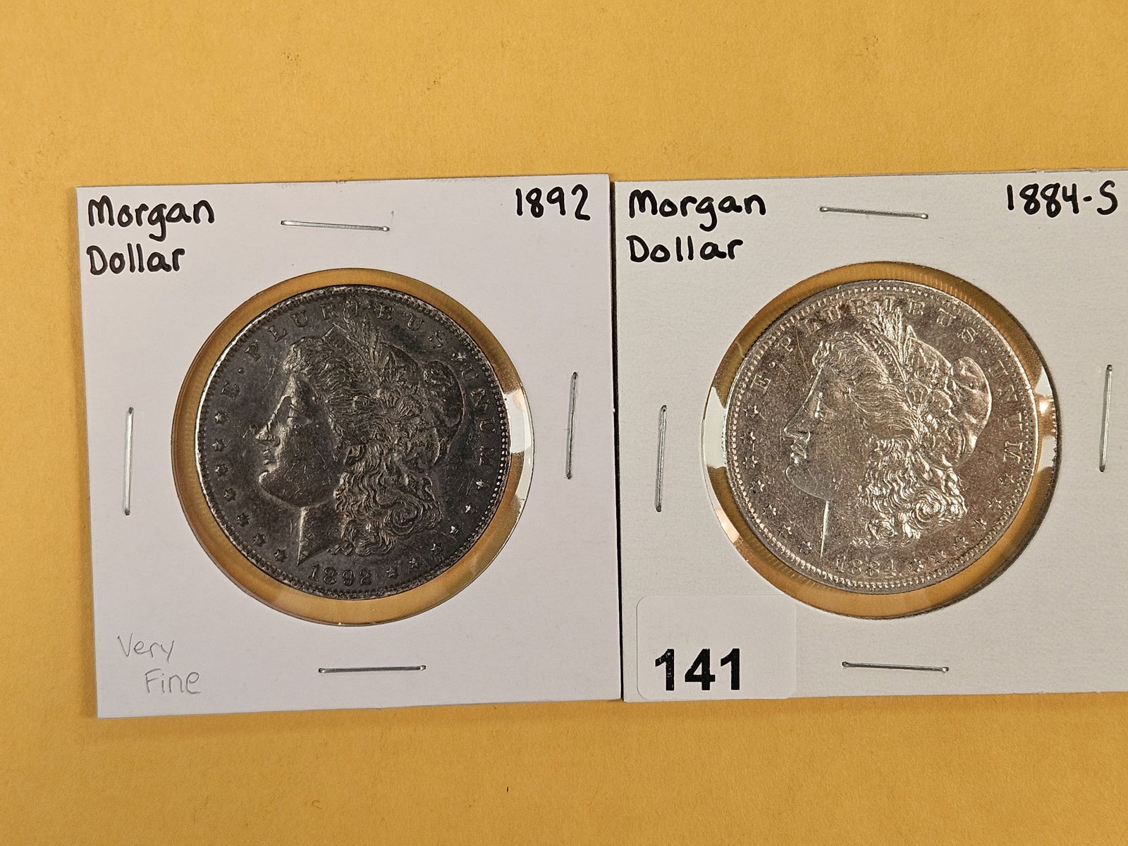 Two Better Date Morgan Silver dollars: 1892 and 1884-S 