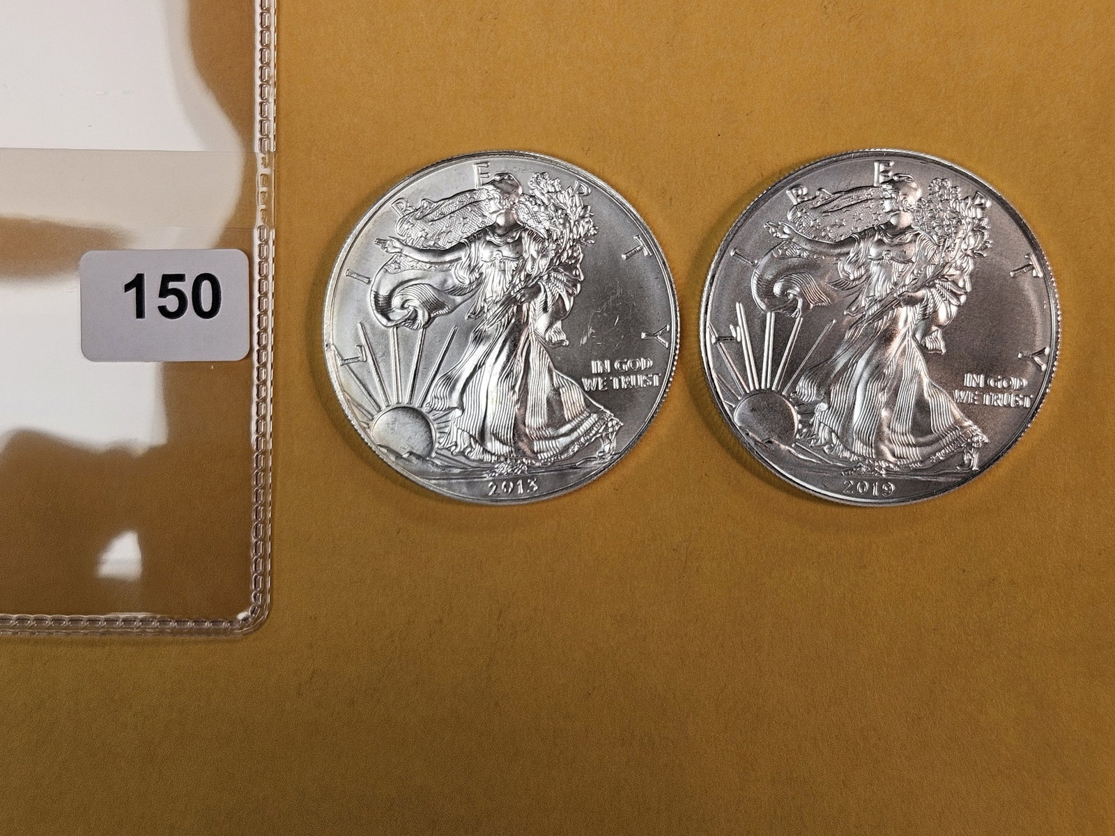 Two GEM Brilliant Uncirculated American Silver Eagles: 2013 and 2019 