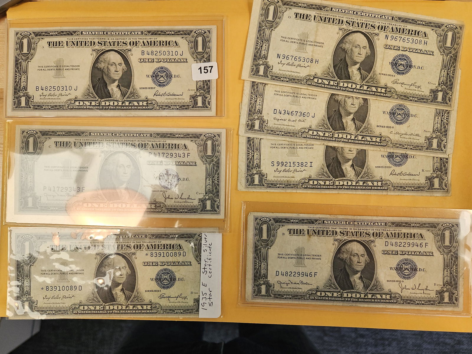 Seven mixed 1935 One Dollar Silver Certificates: Mixed grades 