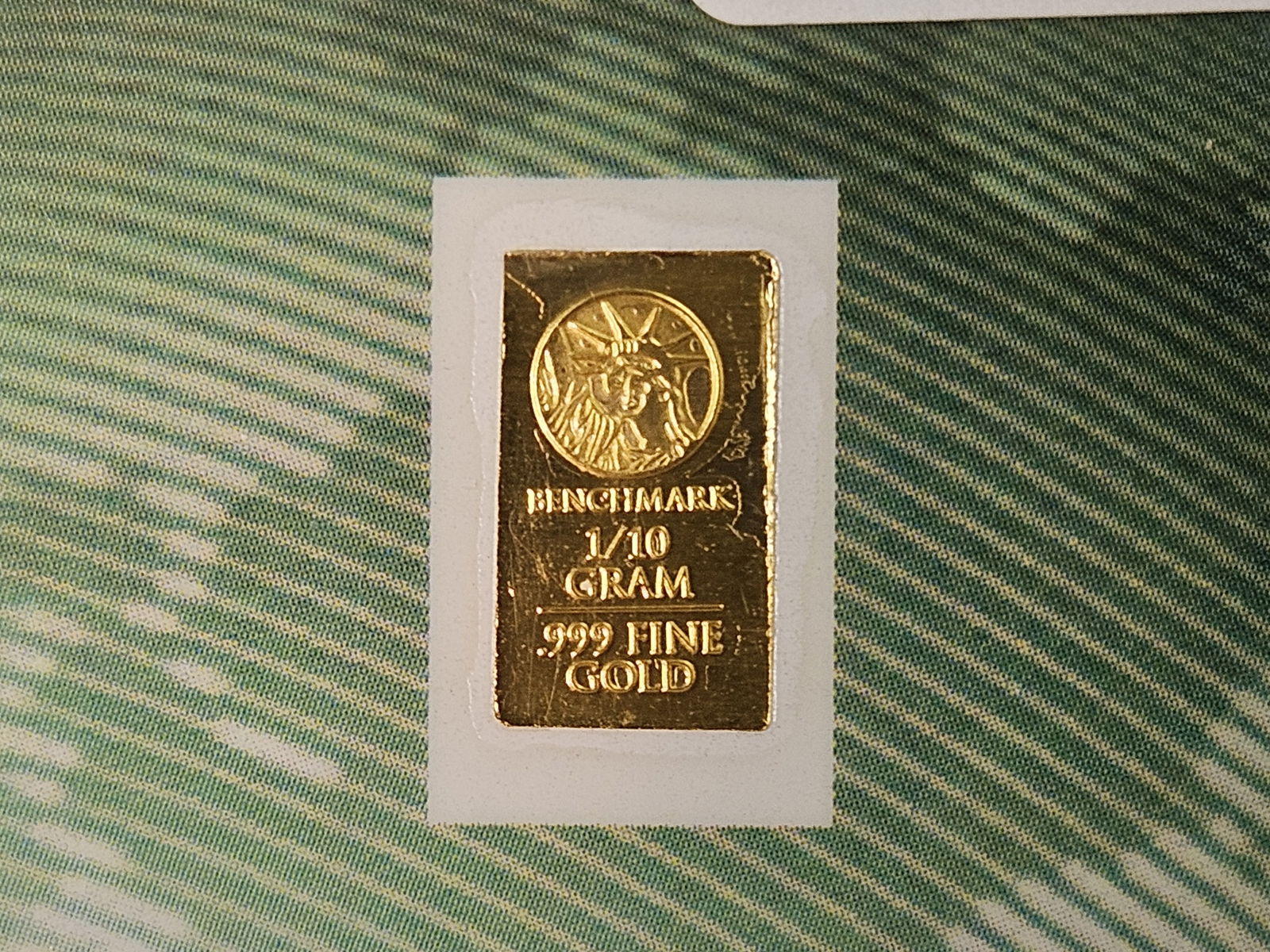 GOLD! One-tenth Gram .9999 fine gold bar: In original assay holder