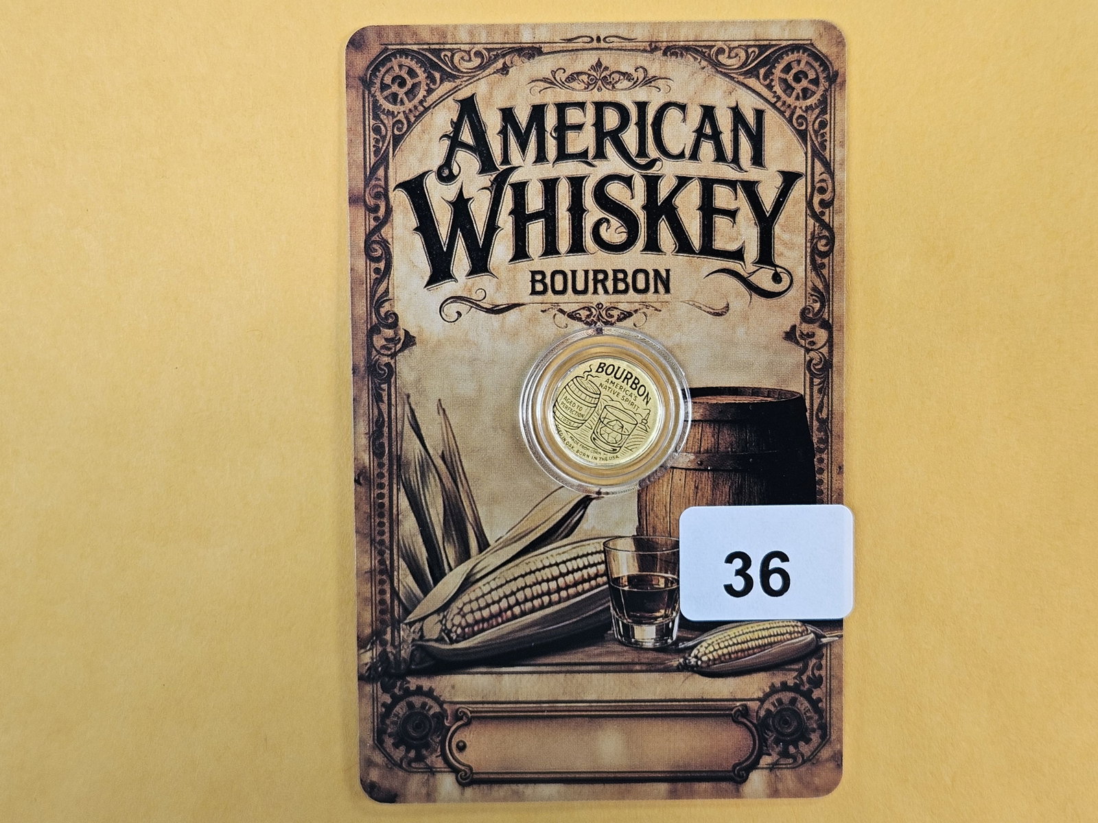 GOLD! GEM 2026 Niue Gold 50 cents: American Whiskey Bourbon design. .9999 fine gold. In assay holder