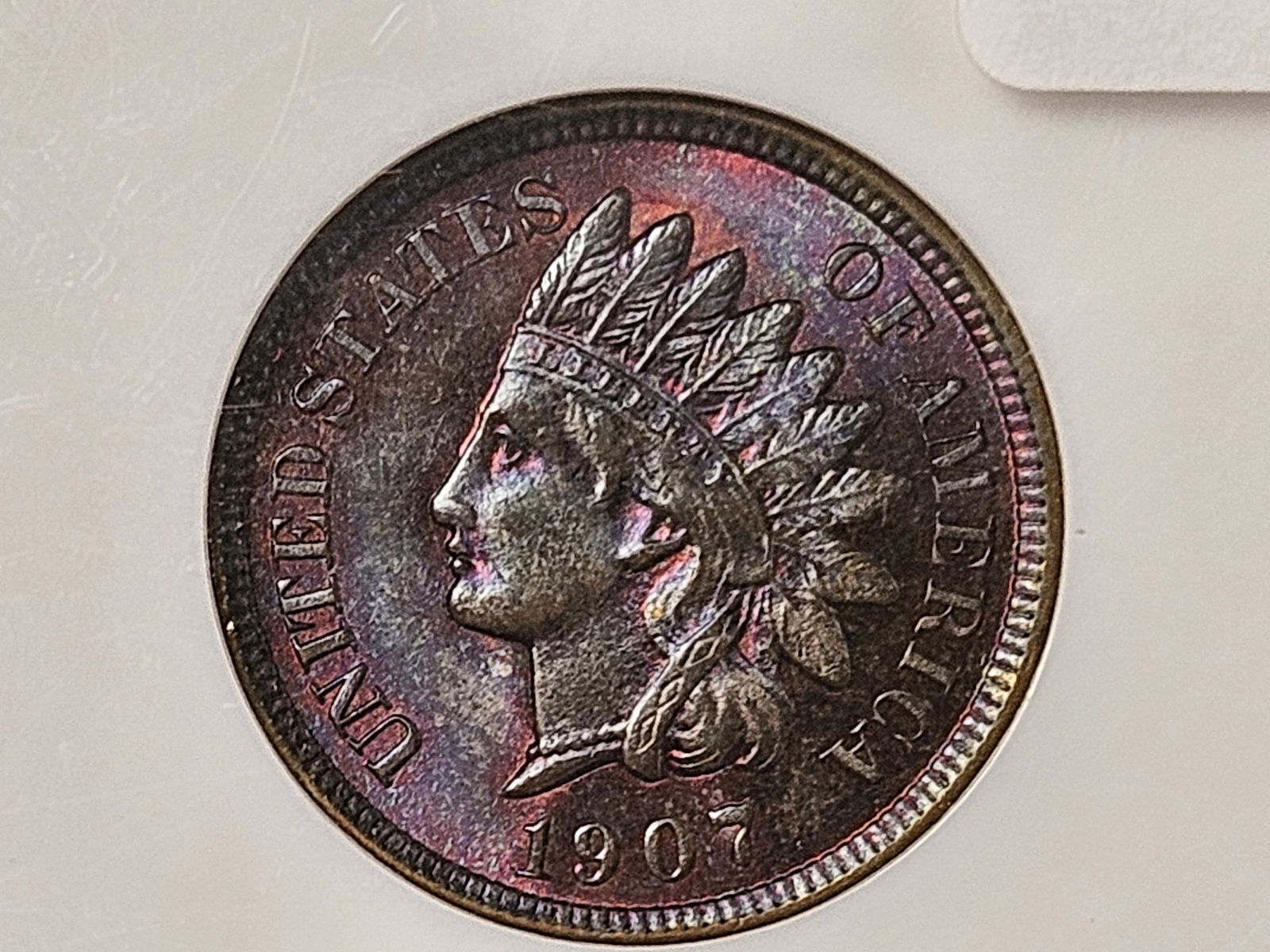* GEM * NGC 1907 Indian Cent in Mint State 66 Brown: Amazing luster! Almost looks purplish! Deep red-purple patina with a fantastic cartwheel!