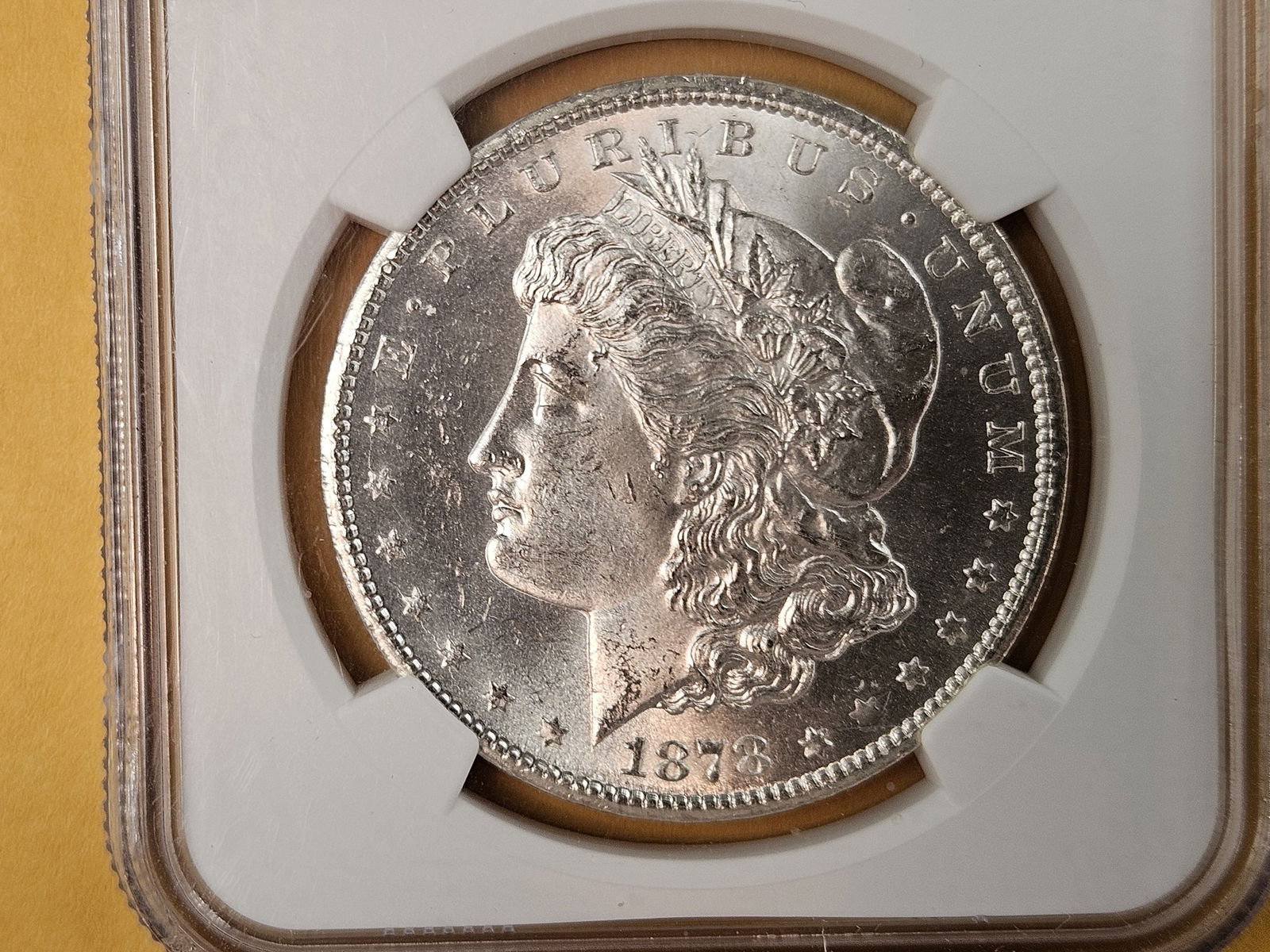 ** KEY DATE ** NGC 1878-CC Morgan Dollar in Mint State 64: KEY DATE! CARSON CITY! First year issue! Great luster. Sharp Strike! 