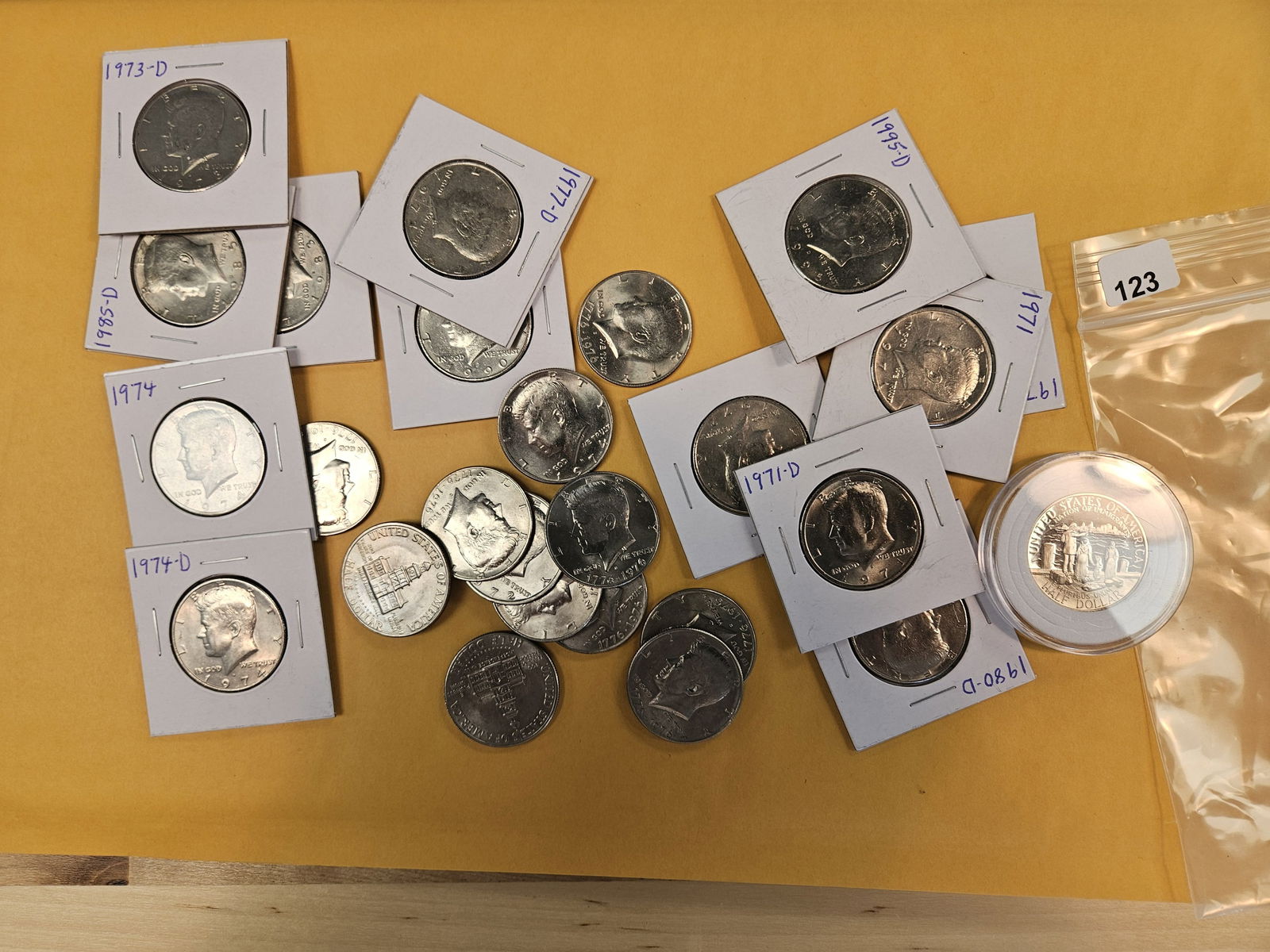 Half dollar bonanza: Well…..not really a bonanza…but a bunch of Kennedy clad half dollars. Mixed dates and grades, plus a proof half