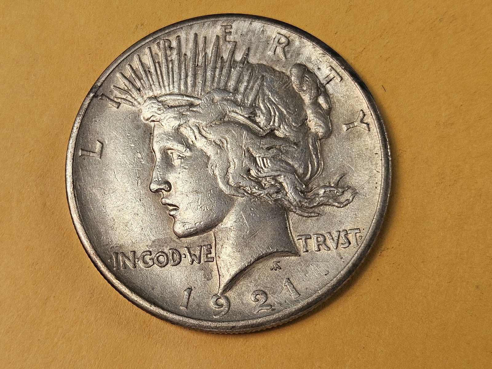 ** KEY DATE ** 1921 Peace silver Dollar in Extra Fine to About Uncirculated (1 of 5)