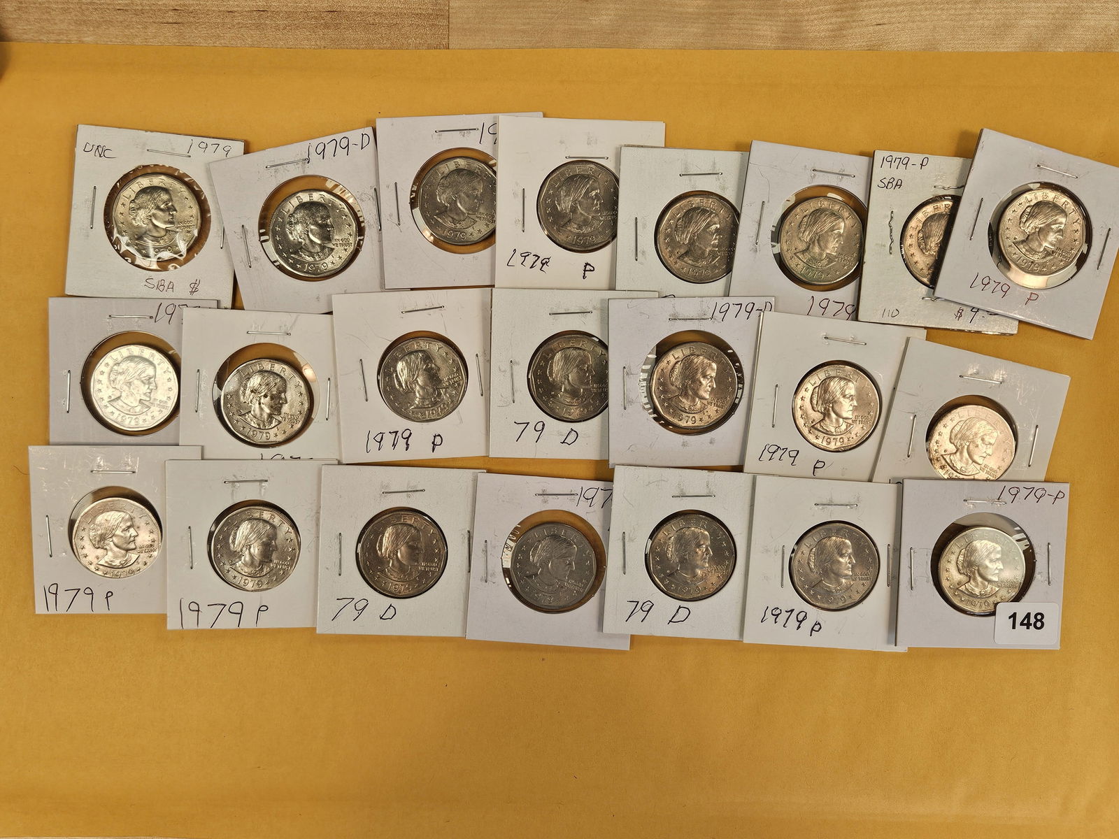 Twenty-two Susan B Anthony Dollars: Mixed dates and grades 