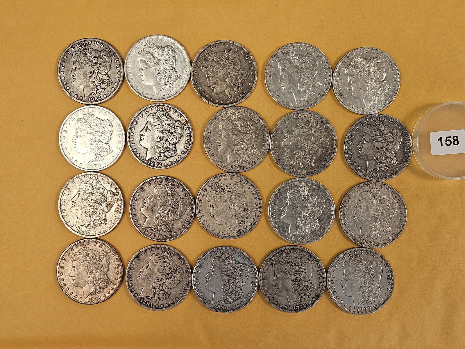 ** FULL ROLL ** Twenty Morgan Silver Dollars: All Pre-1904. Mixed dates and grades from Fine through About Uncirculated plus - details 