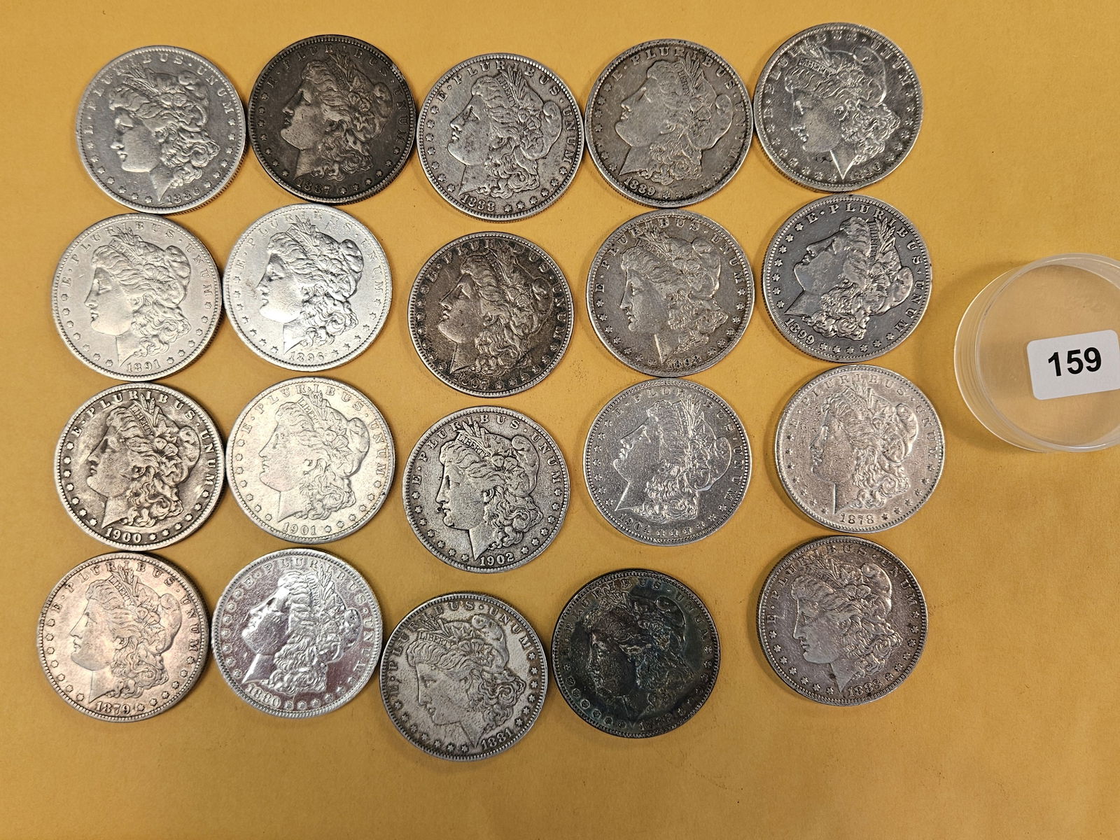 ** FULL ROLL ** Twenty Morgan Silver Dollars: All Pre-1904. Mixed dates and grades from Fine through About Uncirculated plus - details 