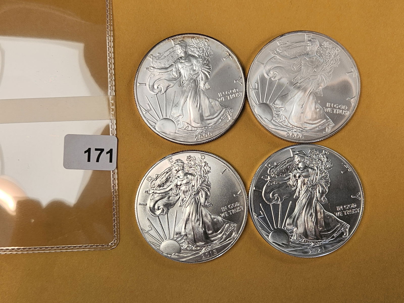 Four GEM Brilliant Uncirculated American silver Eagles: Mixed 