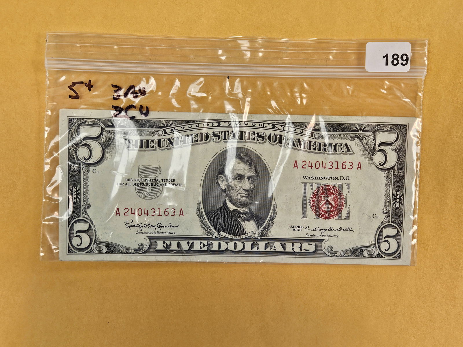 Five Crisp $5 US Red Seal Notes: Three AU and 2 Crisp Uncirculated 