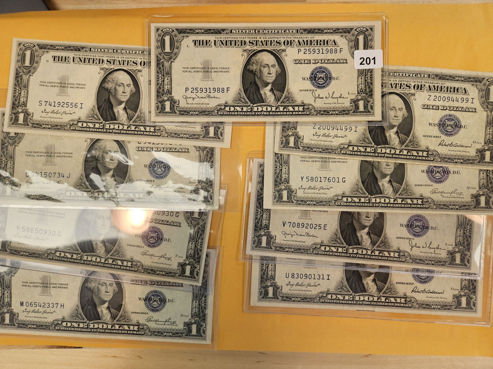 Nine Crisp One Dollar Silver Certificates: AU to UNC 