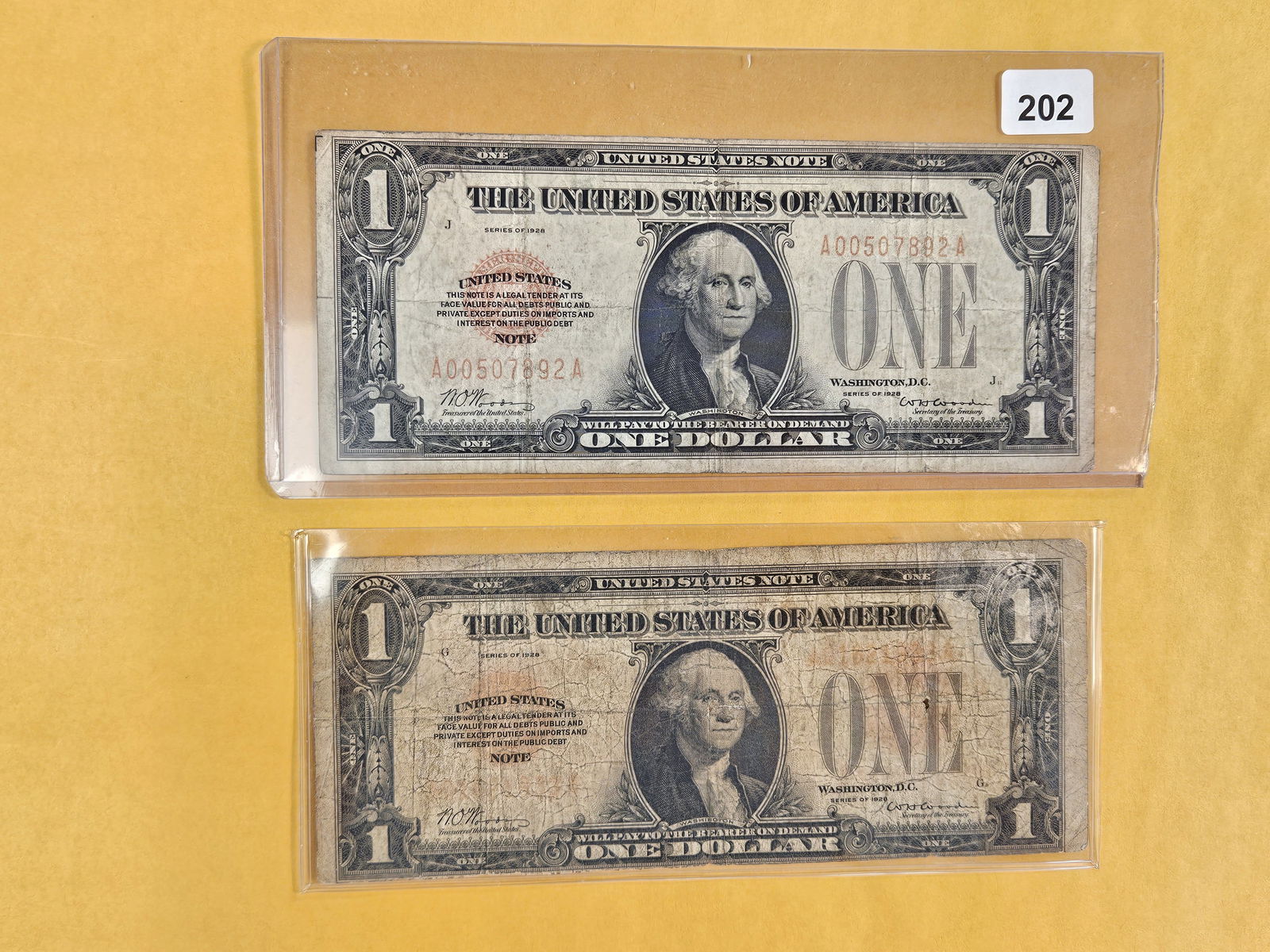 Two Series of 1928 One Dollar US Notes: Funny Backs 