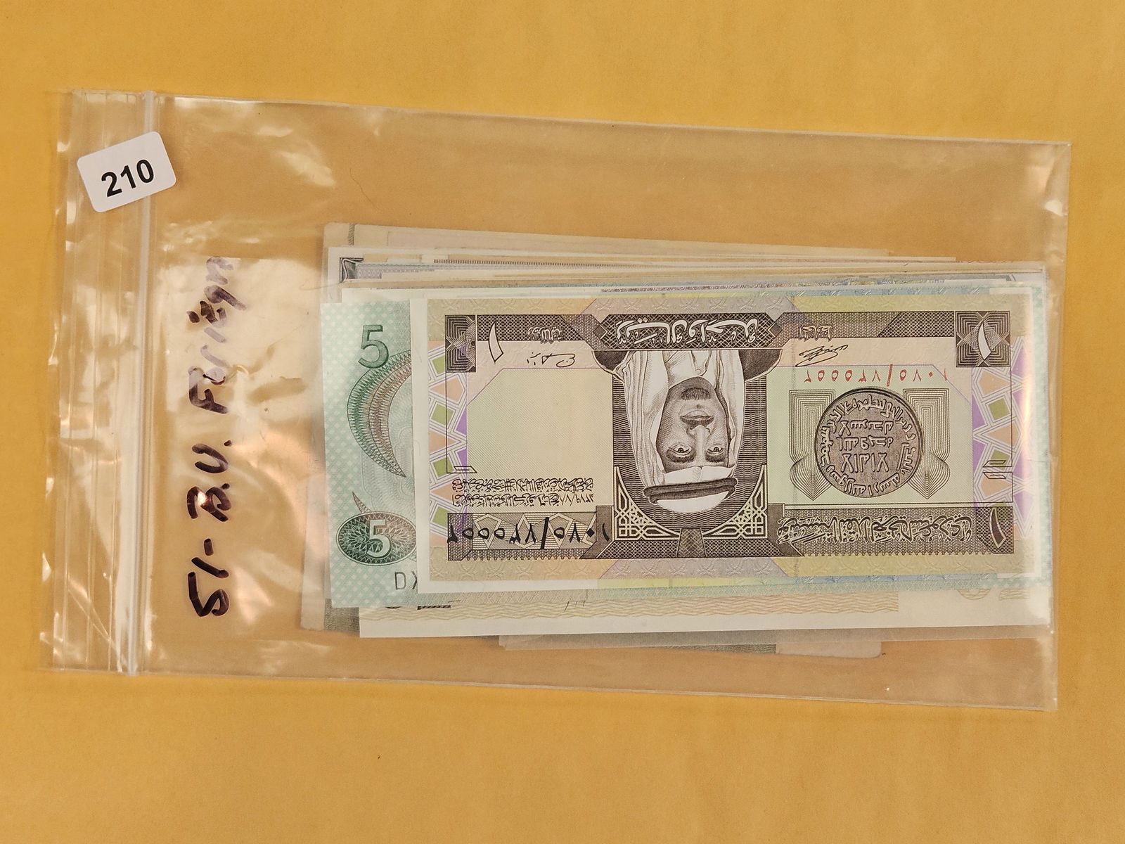 Fifty-one Uncirculated World Notes: Mixed. From dealer. Unchecked by us 