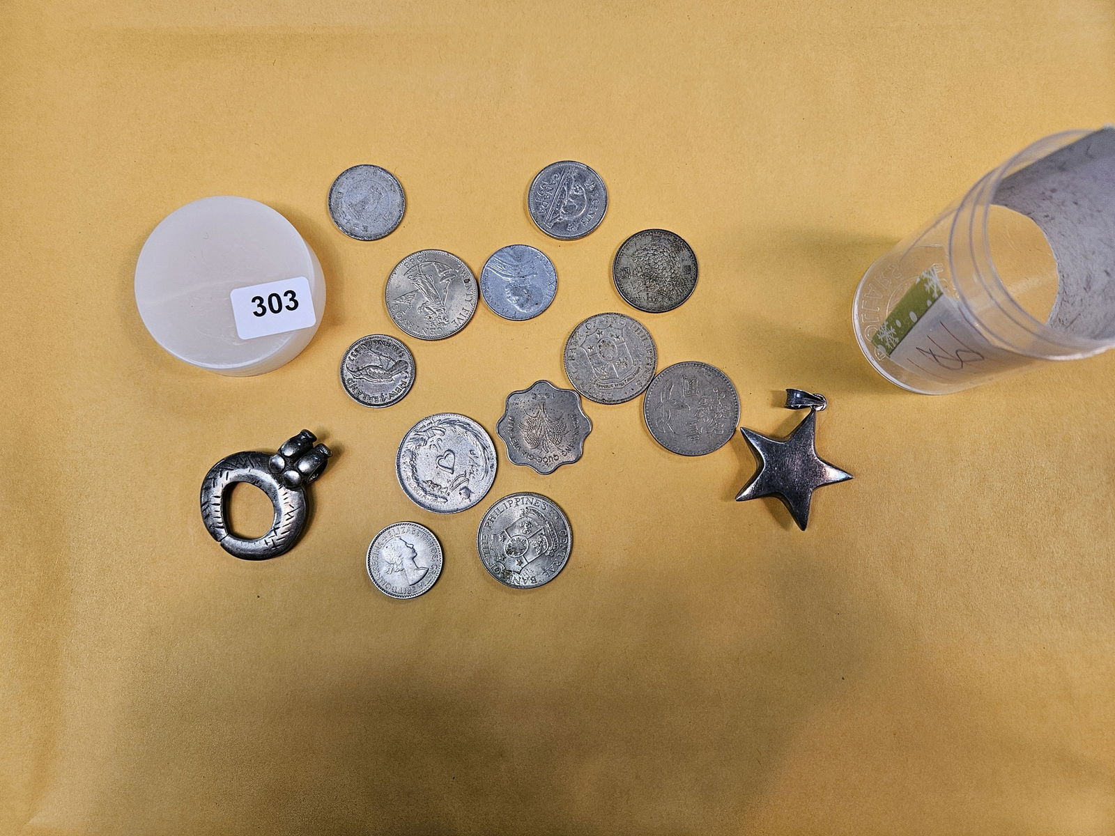 Another Fun mix of hodge-podgieness: Some silver coins, some sterling silver, among others 