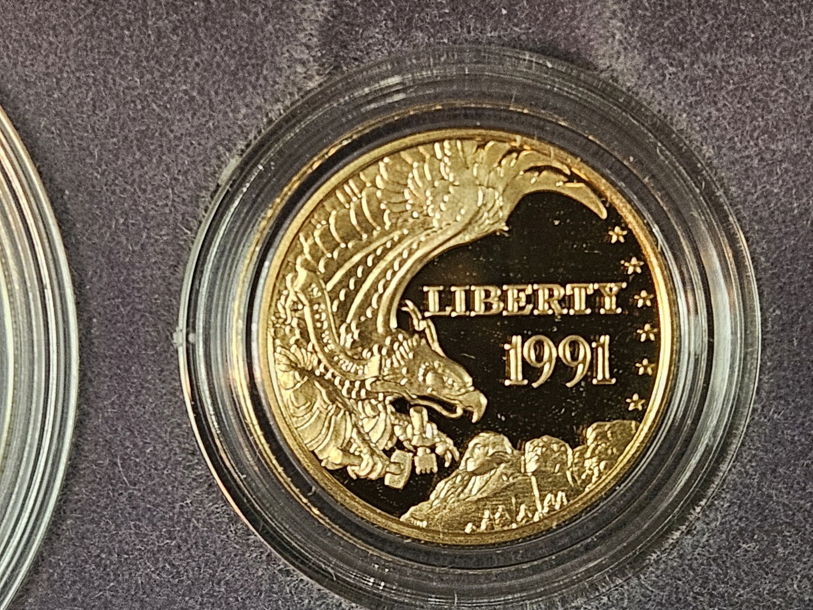 GOLD! GEM Proof Deep Cameo 1991 Mount Rushmore Gold 3-Coin Set: In original government packaging with certificate of authenticity! The $5.00 coin contains .2419 oz. of Gold. The dollar contains .7734 oz. of Silver. 