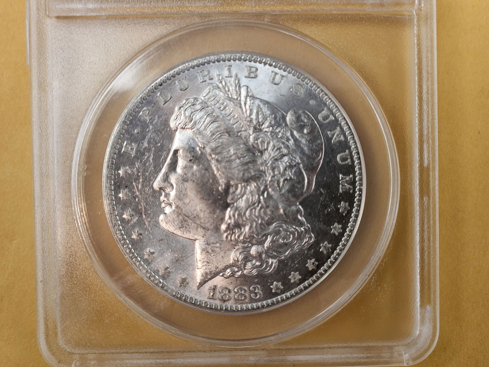 ANACS 1883-O Morgan Dollar in Mint State 62 (1 of 3)