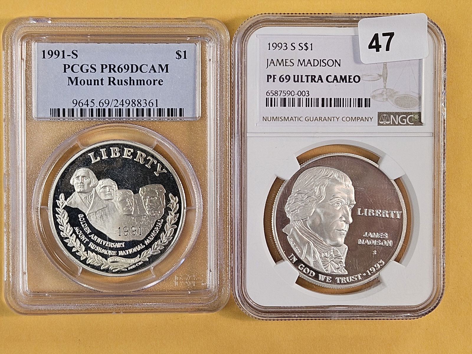 Two, near-perfect, PCGS and NGC-Graded Commemorative silver dollars: 1991-S Mount Rushmore and 1993-S James Madison 