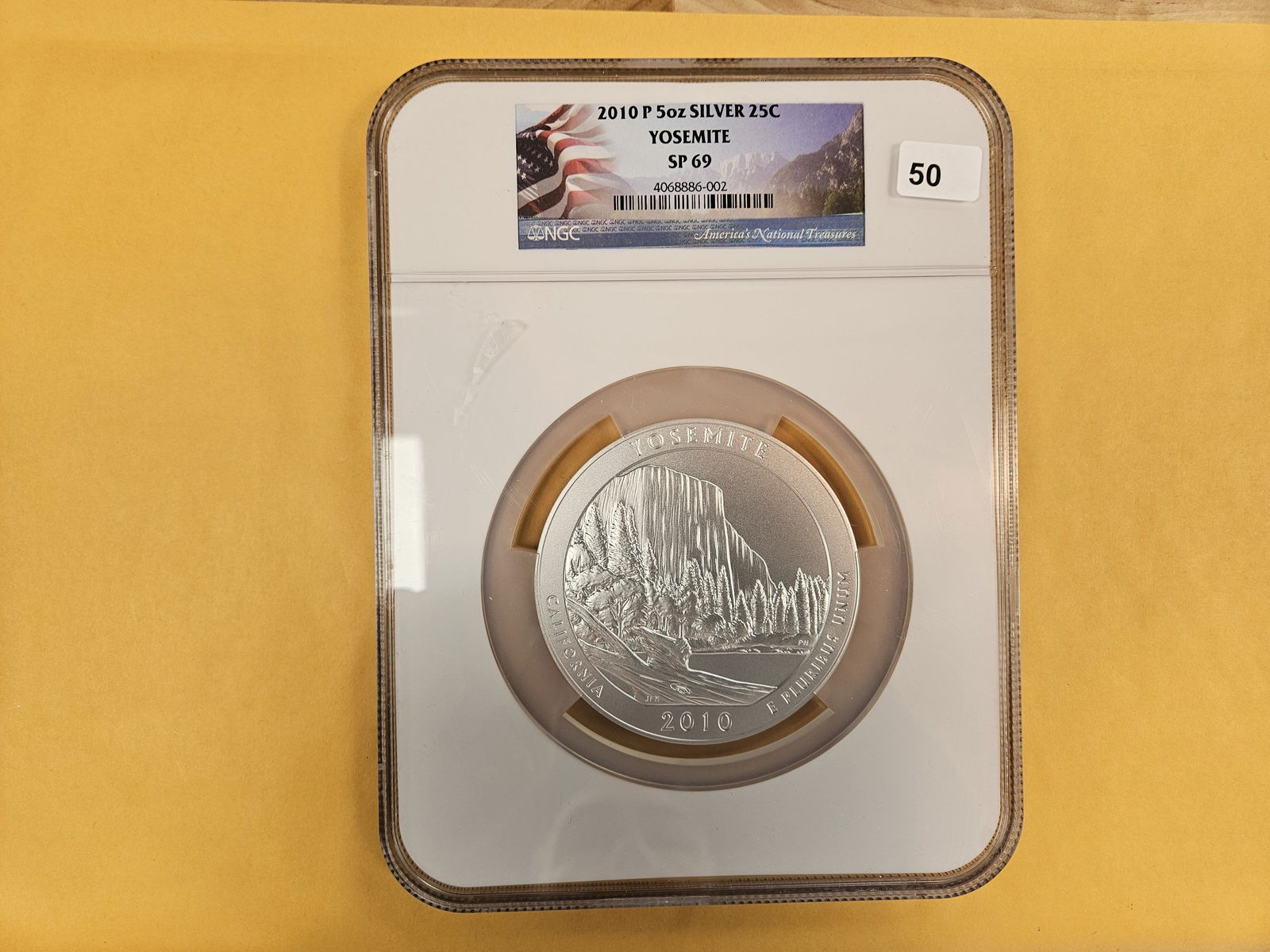 LARGE! NGC 2010-P FIVE OUNCE SILVER Washington Quarter in Specimen 69: Five Troy ounce .999 fine silver. Yosemite 