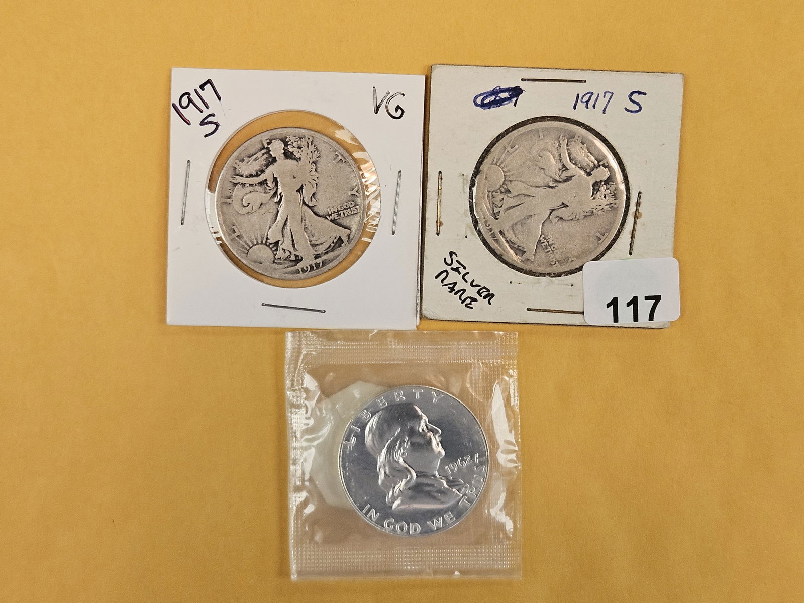 Three mixed silver half dollars: Two little better 1917-S and a proof 1962 Franklin in original blister pack 