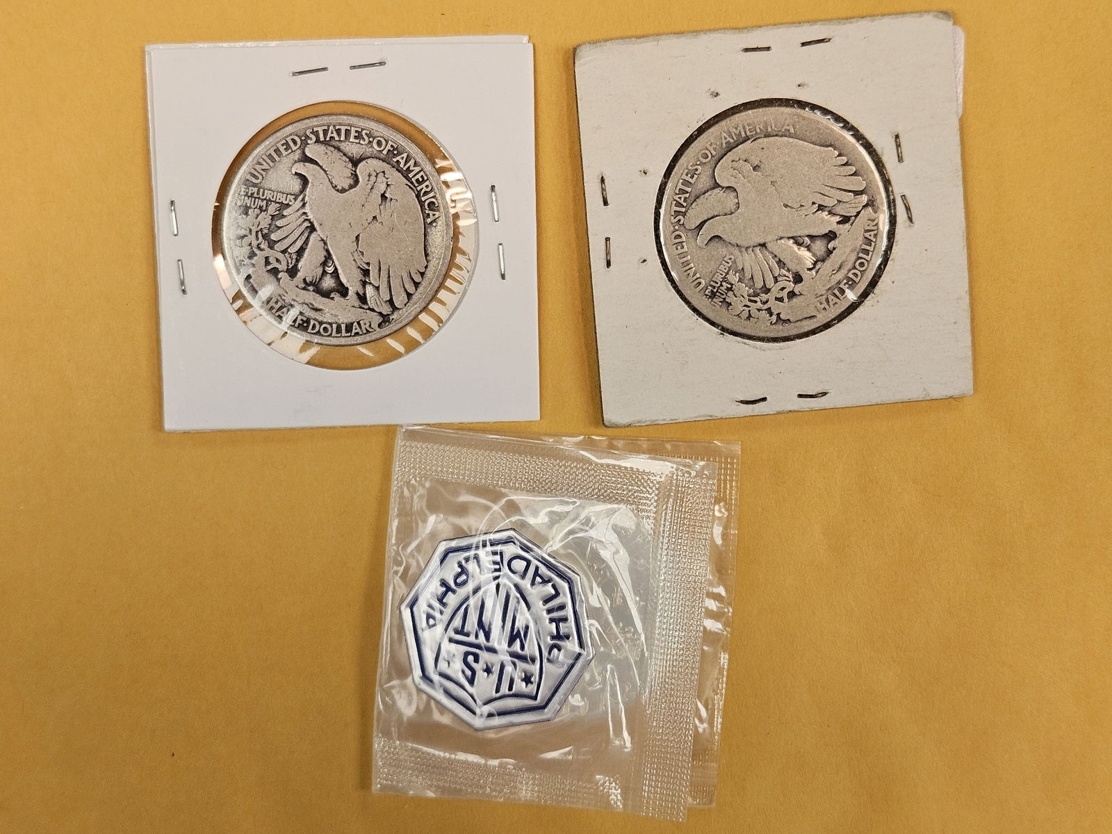 Three mixed silver half dollars - 3