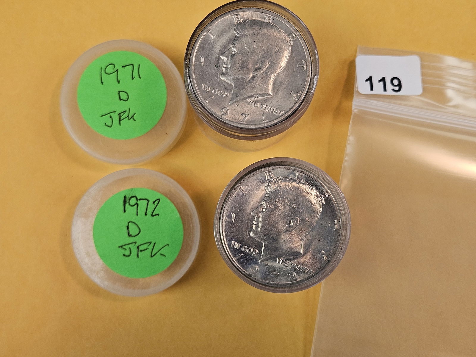 Two Rolls of Kennedy Half Dollars: 1971-D and 1972-D. Top of both look in the AU range 