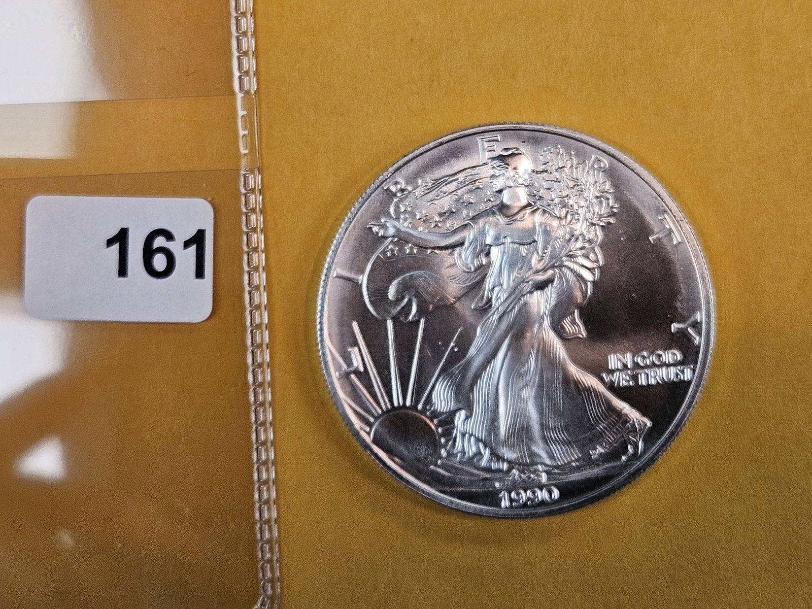 GEM Brilliant Uncirculated 1990 American Silver Eagle: Roll Fresh 