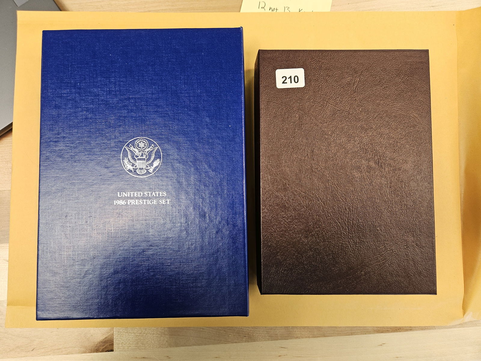 Two GEM 1983 and 1986 US SILVER Prestige Sets: Both in OGP with COAs 