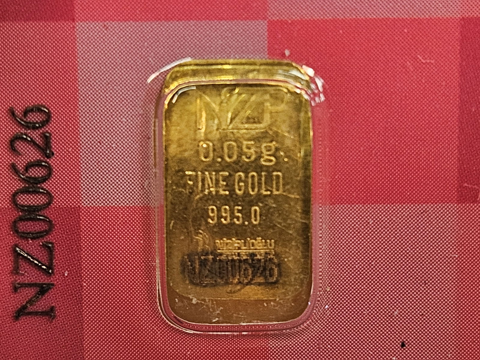 GOLD! NZP Turkey .995 fine gold bar in Assay Holder: By Niziplioglu. Weighs .05 grams